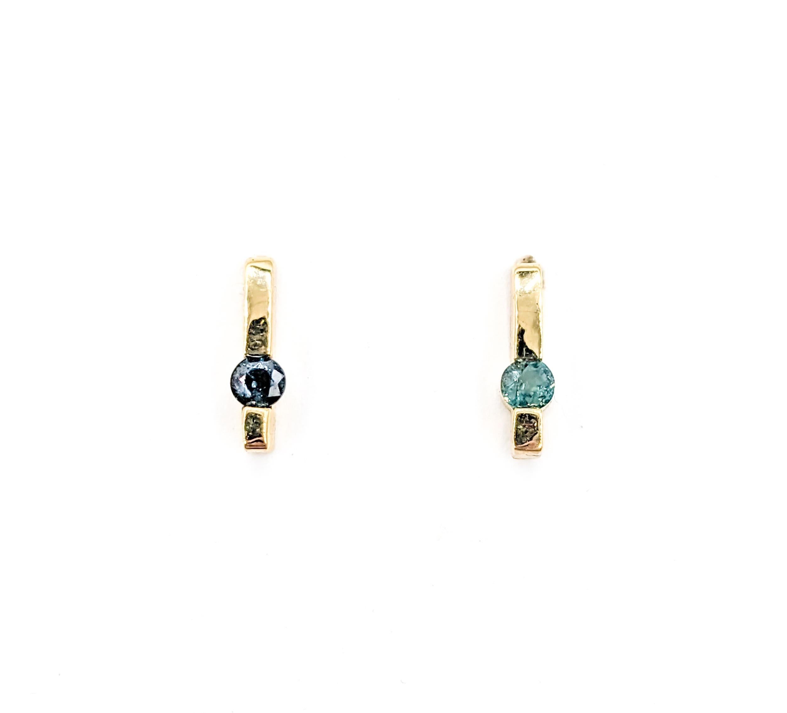 Natural Alexandrite Earrings In Yellow Gold

Introducing these exquisite earrings, crafted in radiant 14kt yellow gold, featuring classic studs undefined clarity. These earrings are further adorned with .27ctw of captivating Brazilian Alexandrite,