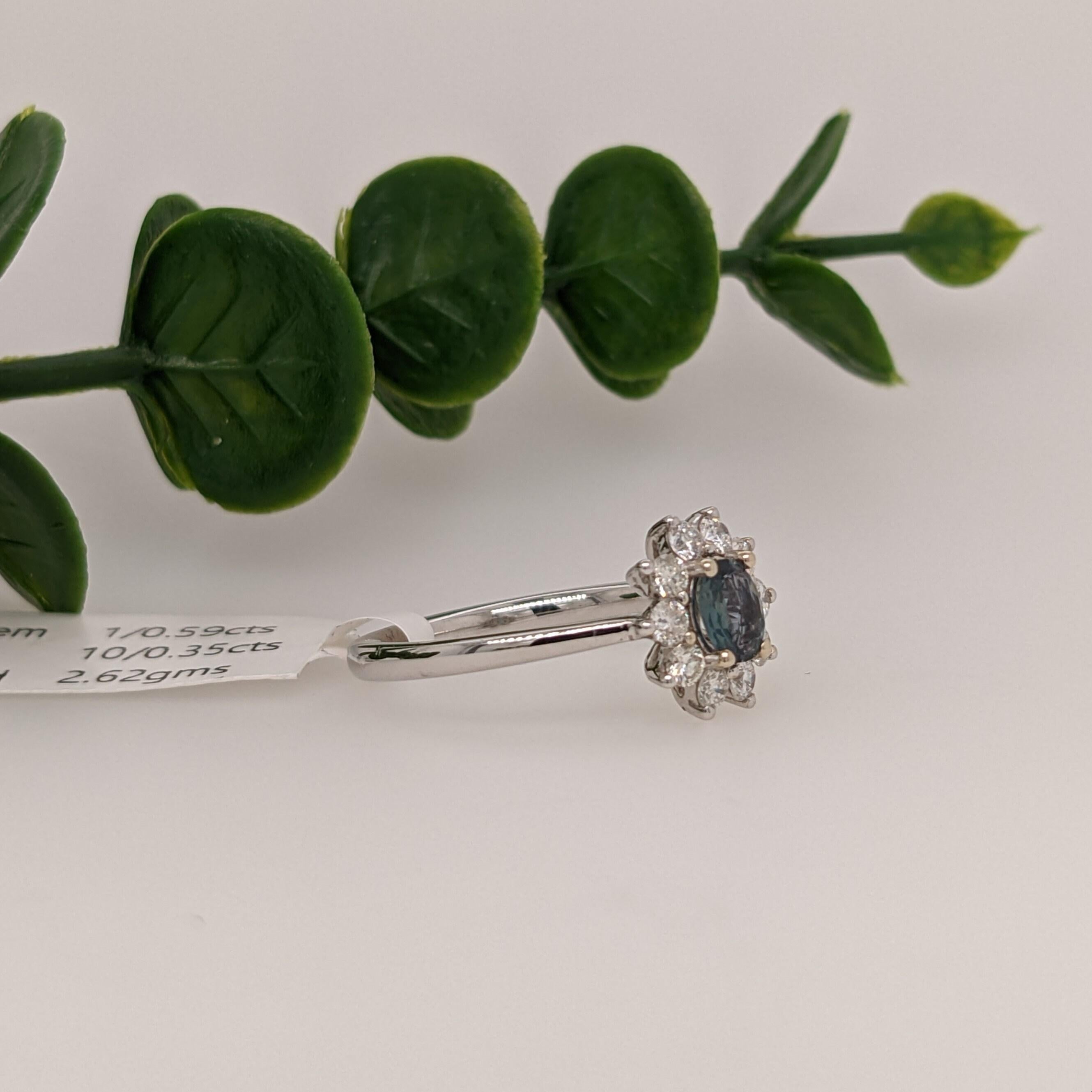 This unique oval cut natural alexandrite is has a large face for it's weight, giving you more gemstone for your dollar! This color changing alexandrite is a green/blue color in daylight with hints of purple that get more prominent in candlelight