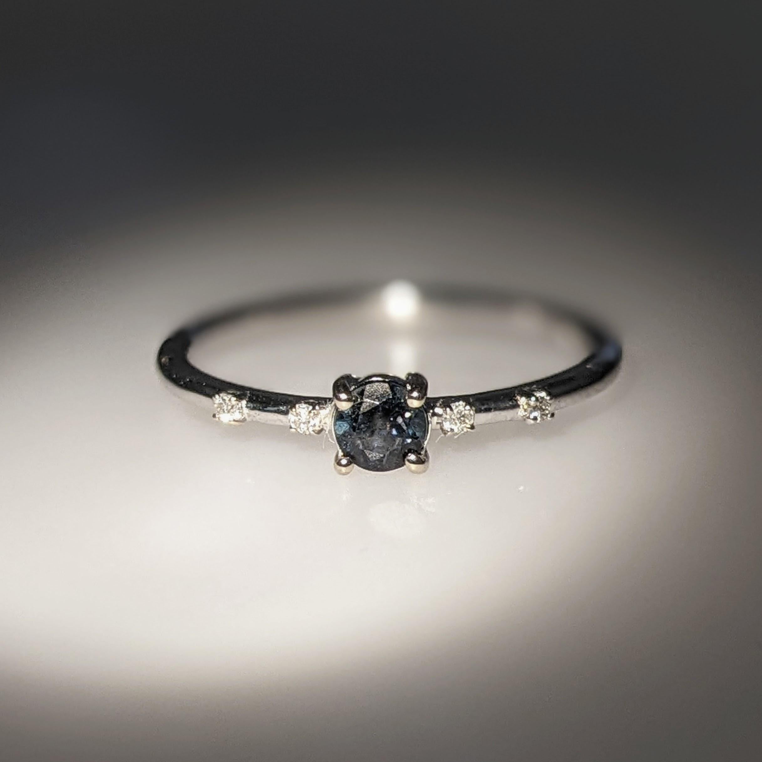 This beautiful ring features an alexandrite in 14k white Gold and four diamond accents. A dainty ring design perfect for an eye catching engagement or anniversary. This ring also makes a beautiful birthstone ring for your loved ones.

The occasions