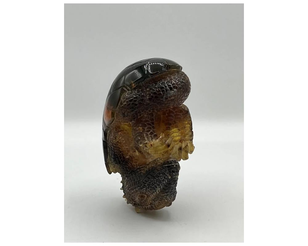 Natural Amber Hand Carved Figurine of a Dragon Dinosaur Egg In Good Condition In New York, NY