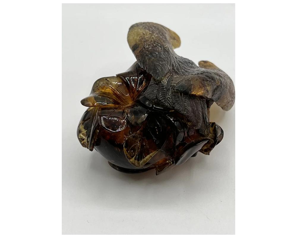 Unknown Natural Amber Hand Carved Figurine of a Skull with Owl For Sale