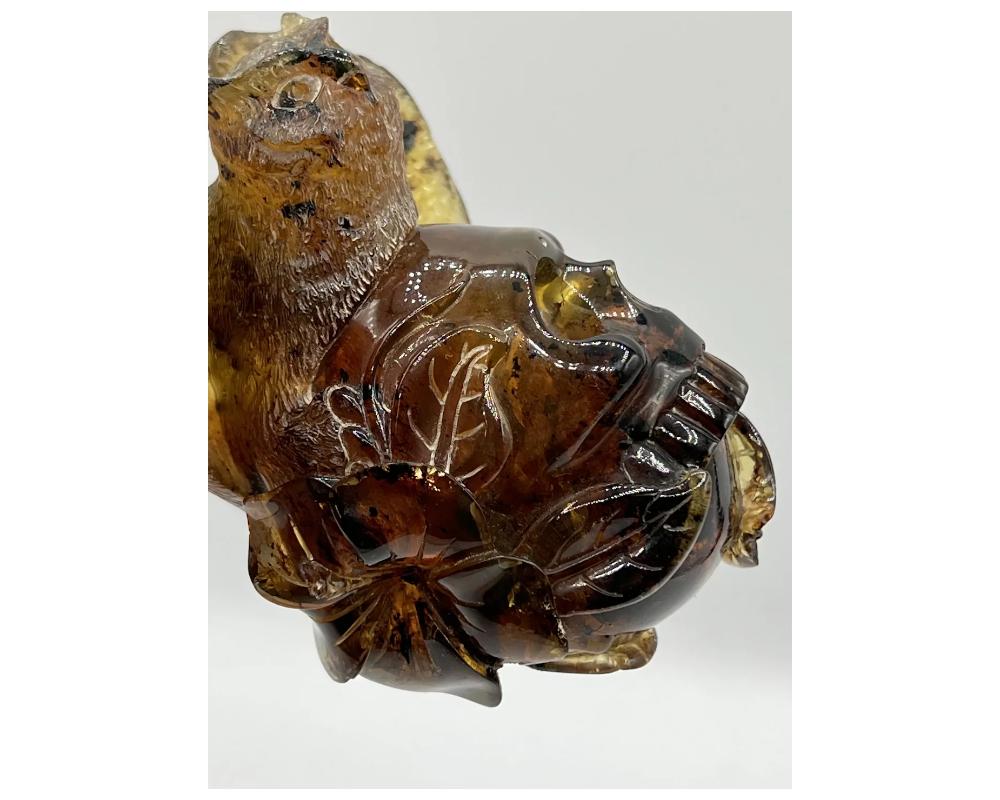 Natural Amber Hand Carved Figurine of a Skull with Owl In Good Condition For Sale In New York, NY