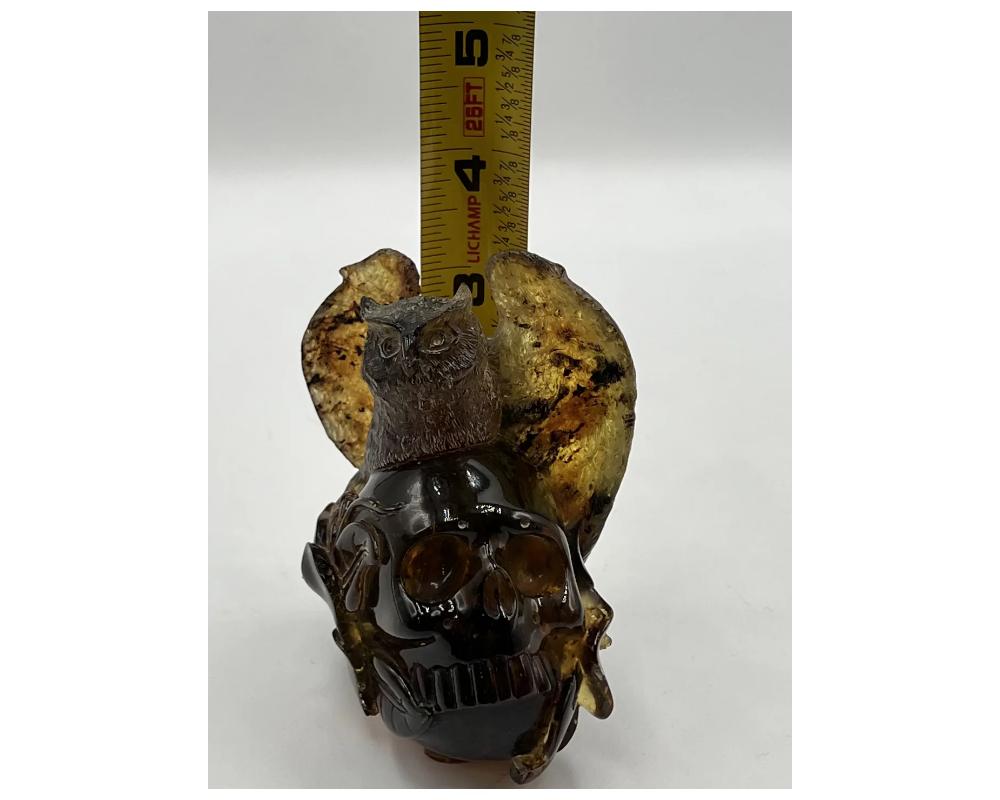 Natural Amber Hand Carved Figurine of a Skull with Owl For Sale 1