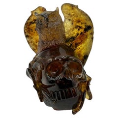 Antique Natural Amber Hand Carved Figurine of a Skull with Owl