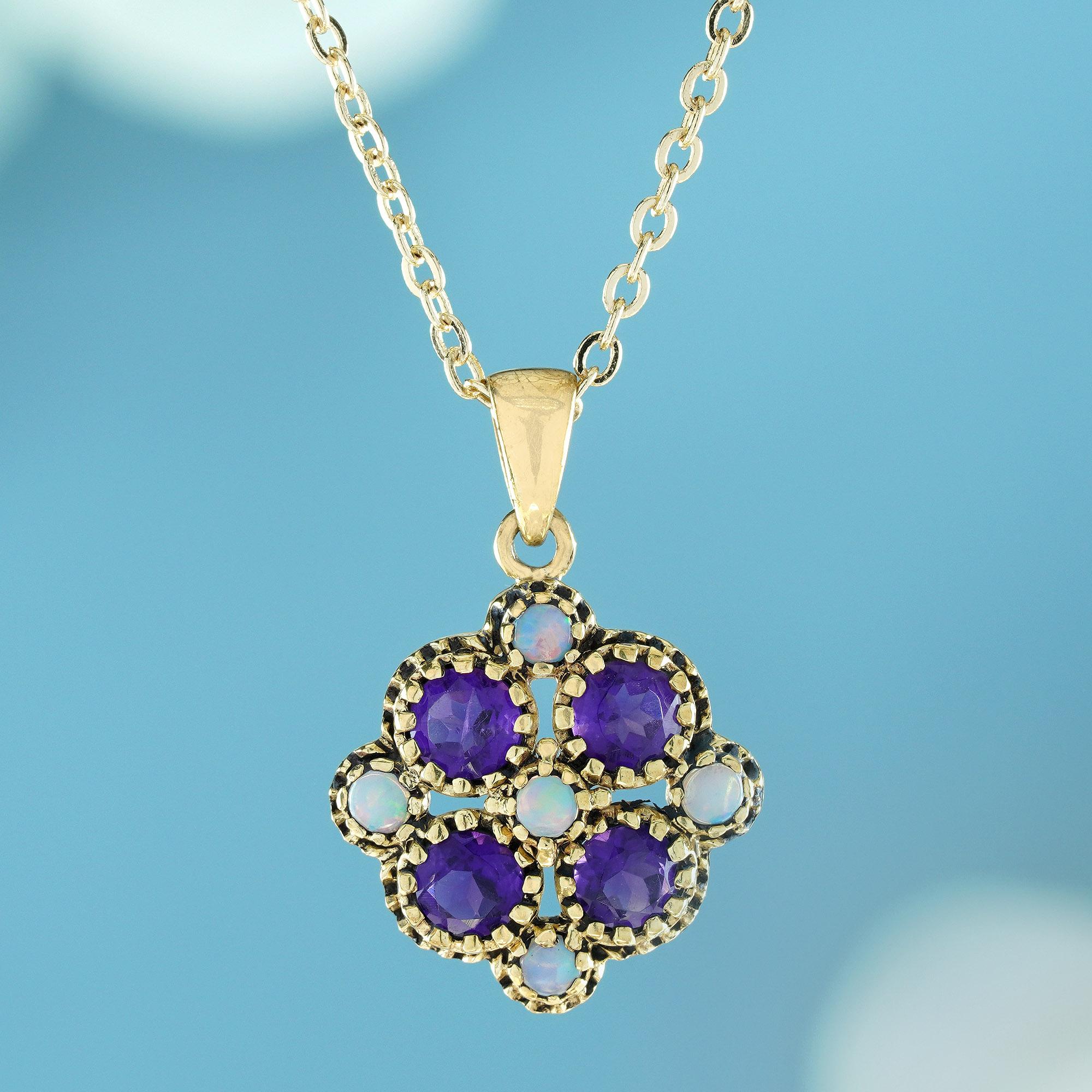  Crafted from yellow gold in a migraine work, this elegant vintage-style floral pendant is embellished with four exquisite round purple amethysts, each resembling delicate petals. Nestled between each amethyst are smaller white opals, adding a