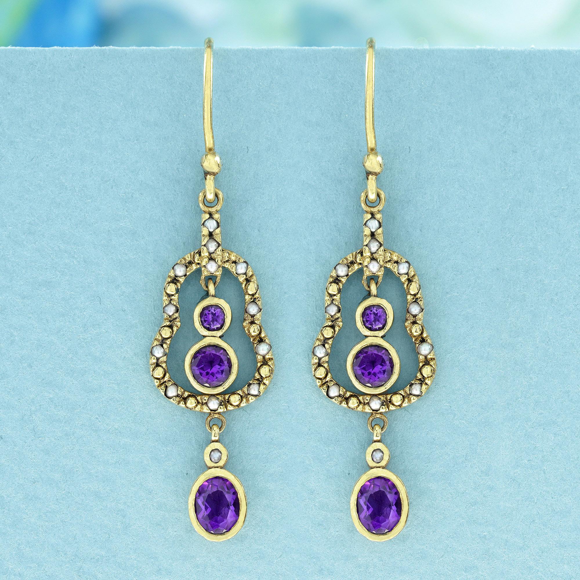 These exquisite earrings boast a vintage allure, crafted with natural amethysts and pearls, set elegantly in yellow gold. Each earring showcases two round, purple amethysts, embraced within round frames nestled inside a bigger pear-shaped frames,