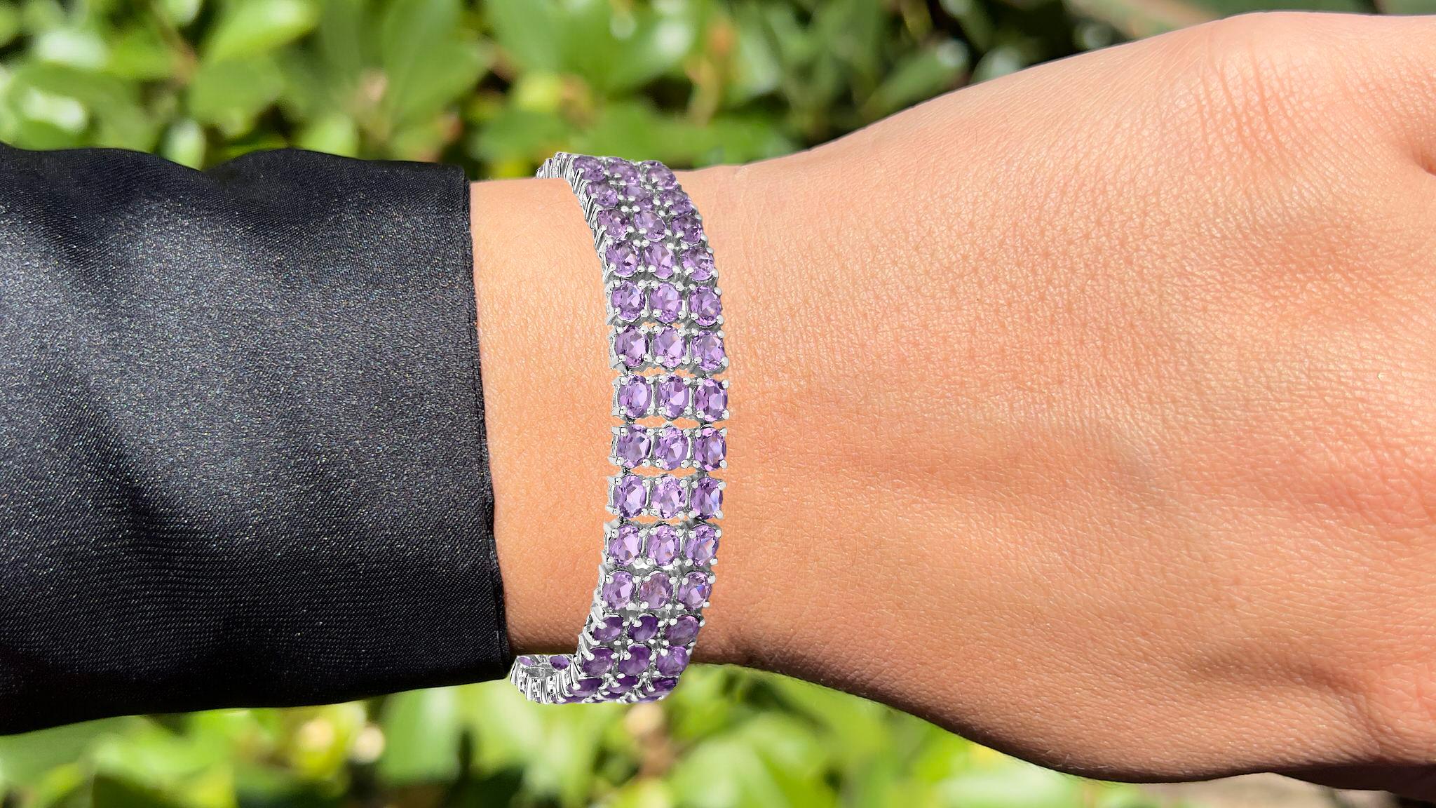 It comes with the appraisal by GIA GG/AJP
All Gemstones are Natural
95 Amethysts = 32.30 Carats
Metal: Rhodium Plated Sterling Silver
Length: 7 Inches