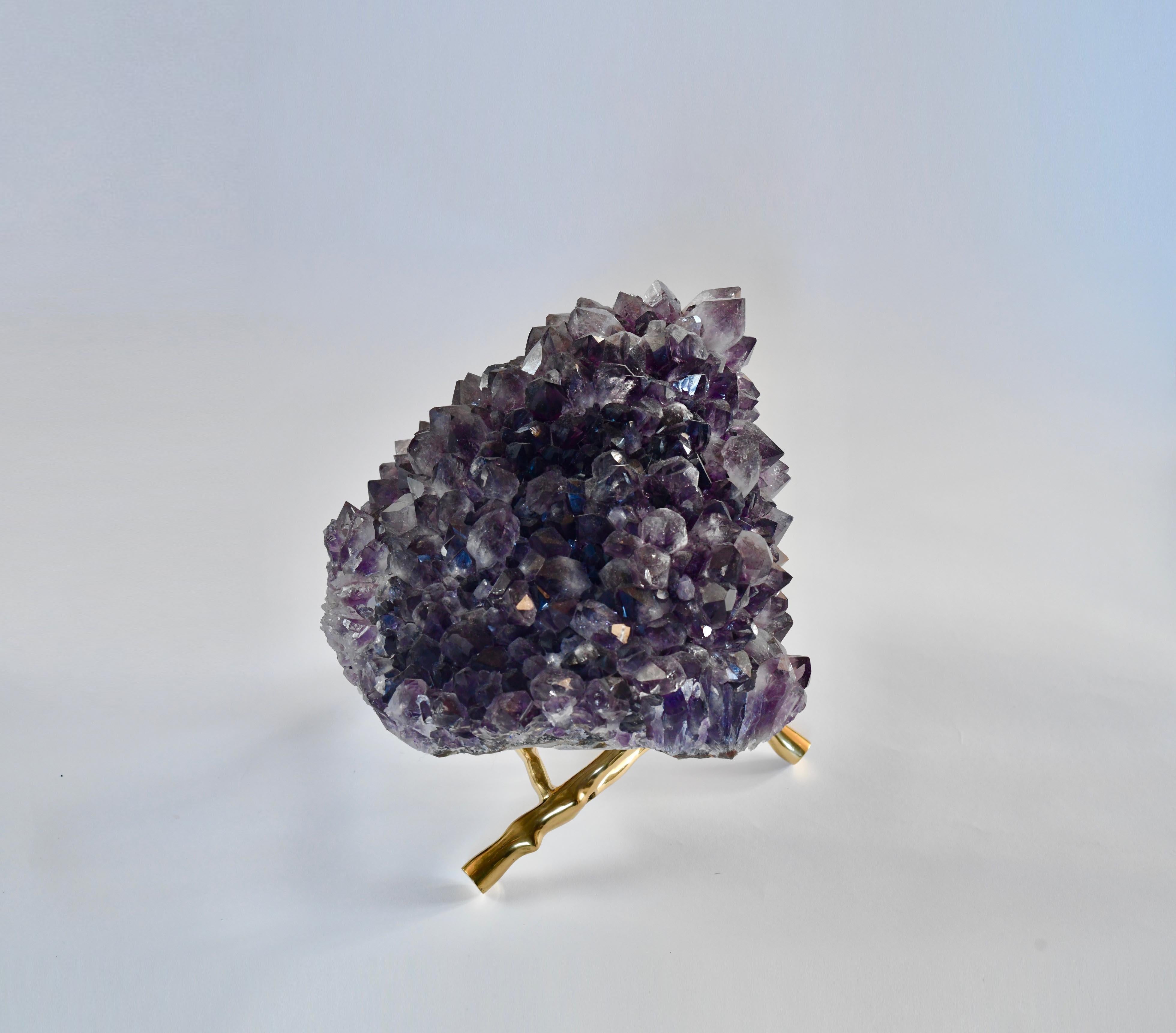 Natural amethyst crystal sculpture with a stand. 
Dimensions without a stand: 12.5