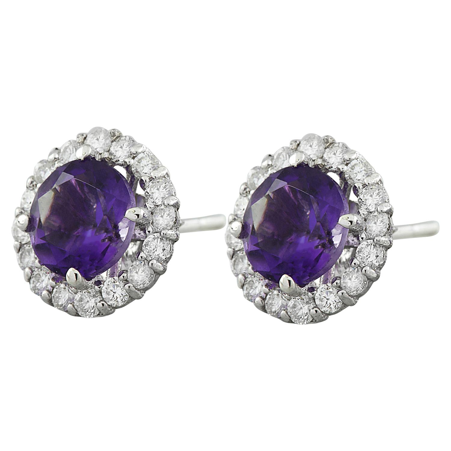 3.65 Carat Natural Amethyst 14 Karat Solid White Gold Diamond Earrings
Stamped: 14K 
Total Earrings Weight: 1.5 Grams 
Amethyst Weight: 3.00 Carat (7.00x7.00 Millimeters)  
Quantity: 2
Diamond Weight: 0.65 Carat (F-G Color, VS2-SI1