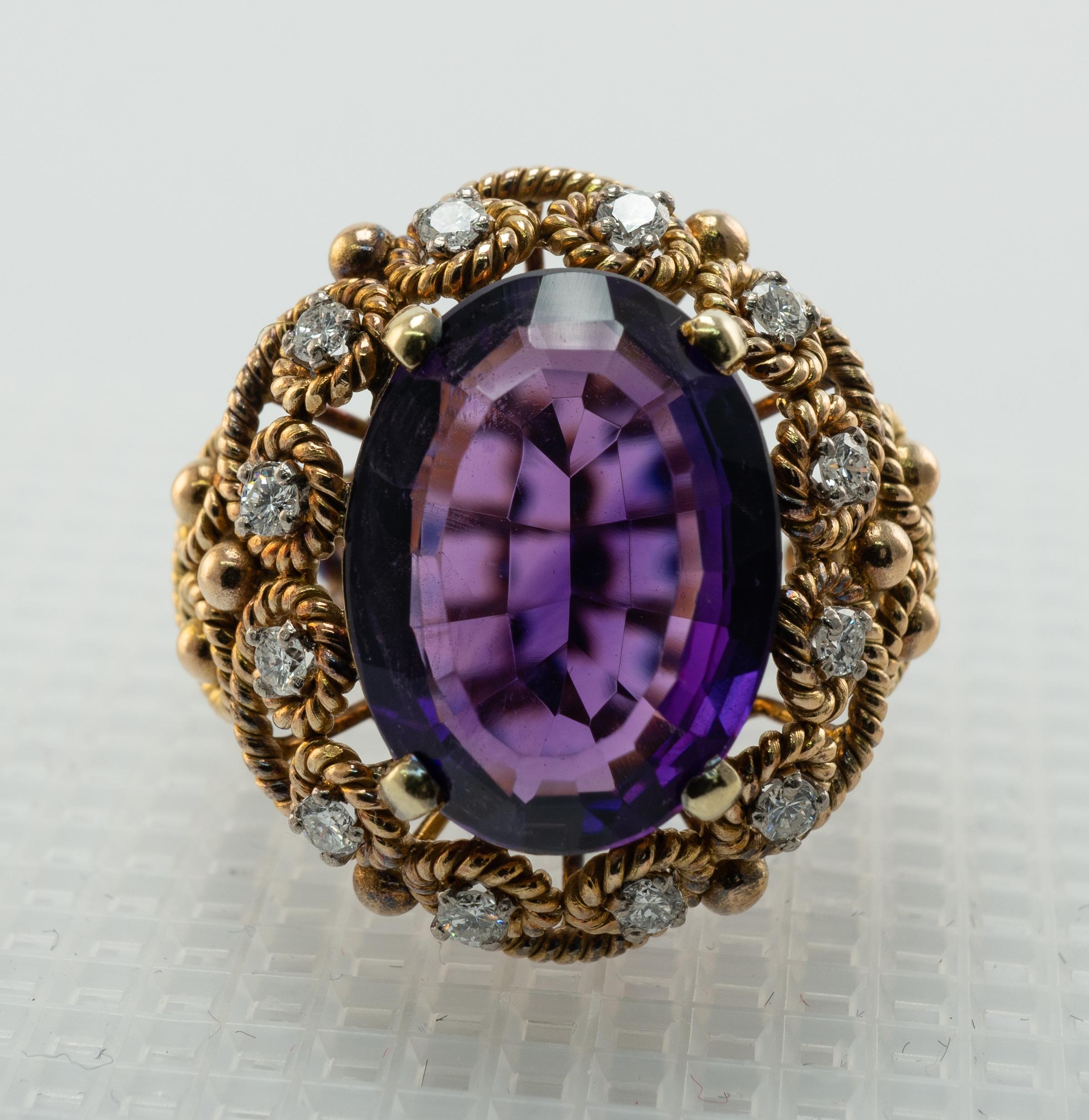 Natural Amethyst Diamond Ring 14K Gold Cocktail Vintage

This stunning vintage ring is finely crafted in solid 14K Yellow Gold (carefully tested and guaranteed) and set with genuine Earth mined Amethyst and Diamonds. 
The center oval cut gem