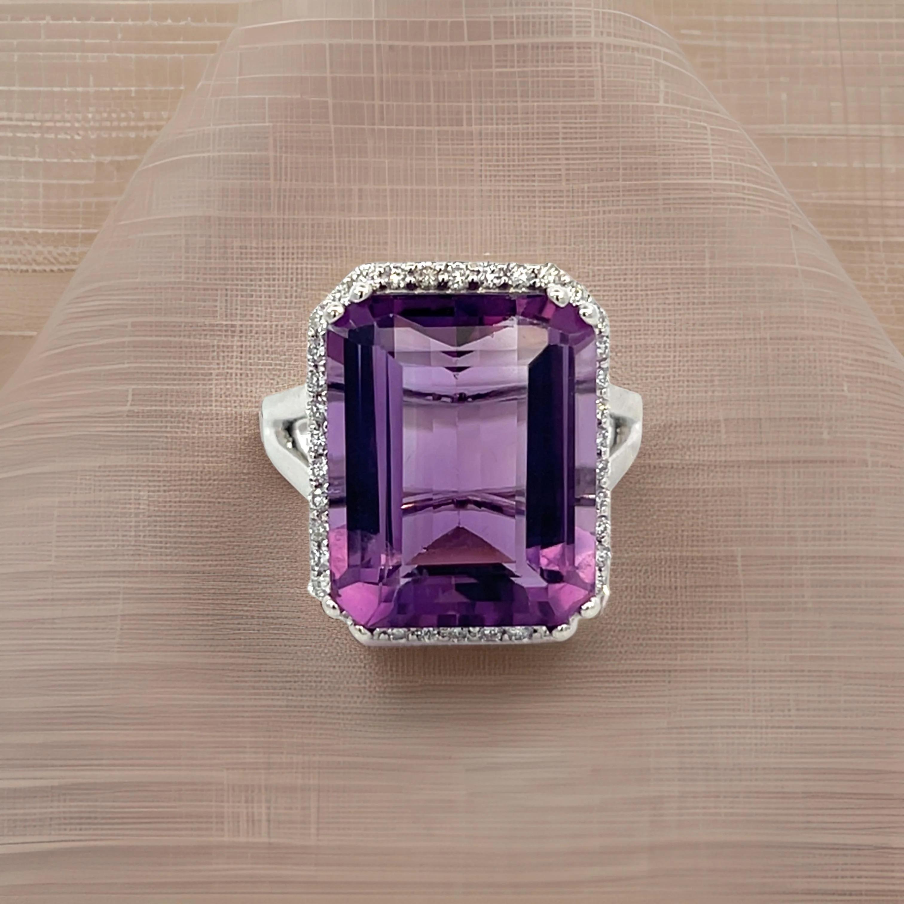 Natural Quality Amethyst and Diamond Ring 14k White Gold 12.48 TCW Certified $4,950 409159

This magnificent natural emerald-cut amethyst and diamond ring is a true statement piece, crafted in 14k white gold with a remarkable total carat weight of