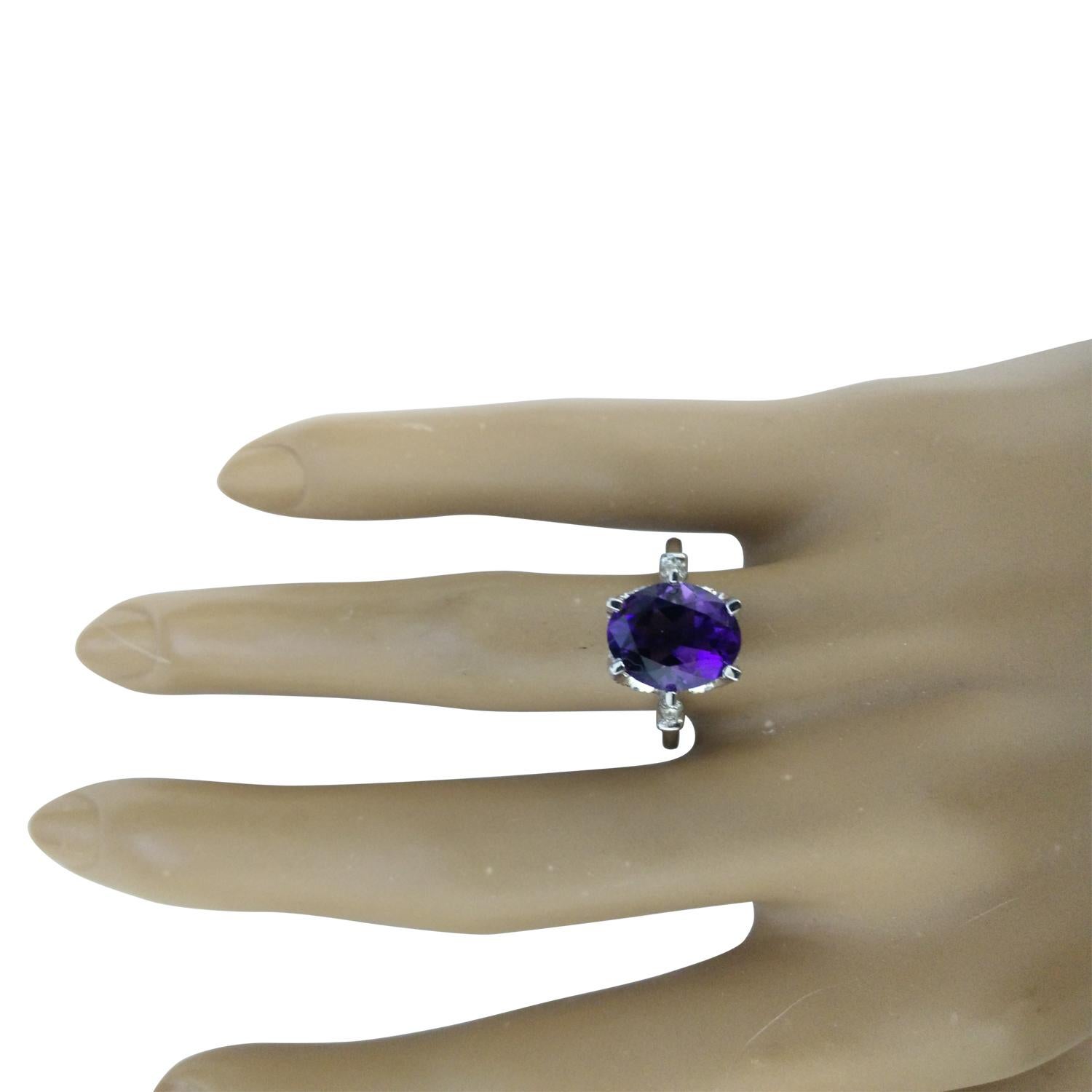 3.41 Carat Natural Amethyst 14 Karat Solid White Gold Diamond Ring
Stamped: 14K 
Total Ring Weight: 4.2 Grams 
Amethyst Weight: 3.26 Carat (11.00x9.00 Millimeters)  
Diamond Weight: 0.15 Carat (F-G Color, VS2-SI1 Clarity )
Quantity: 4
Face Measures: