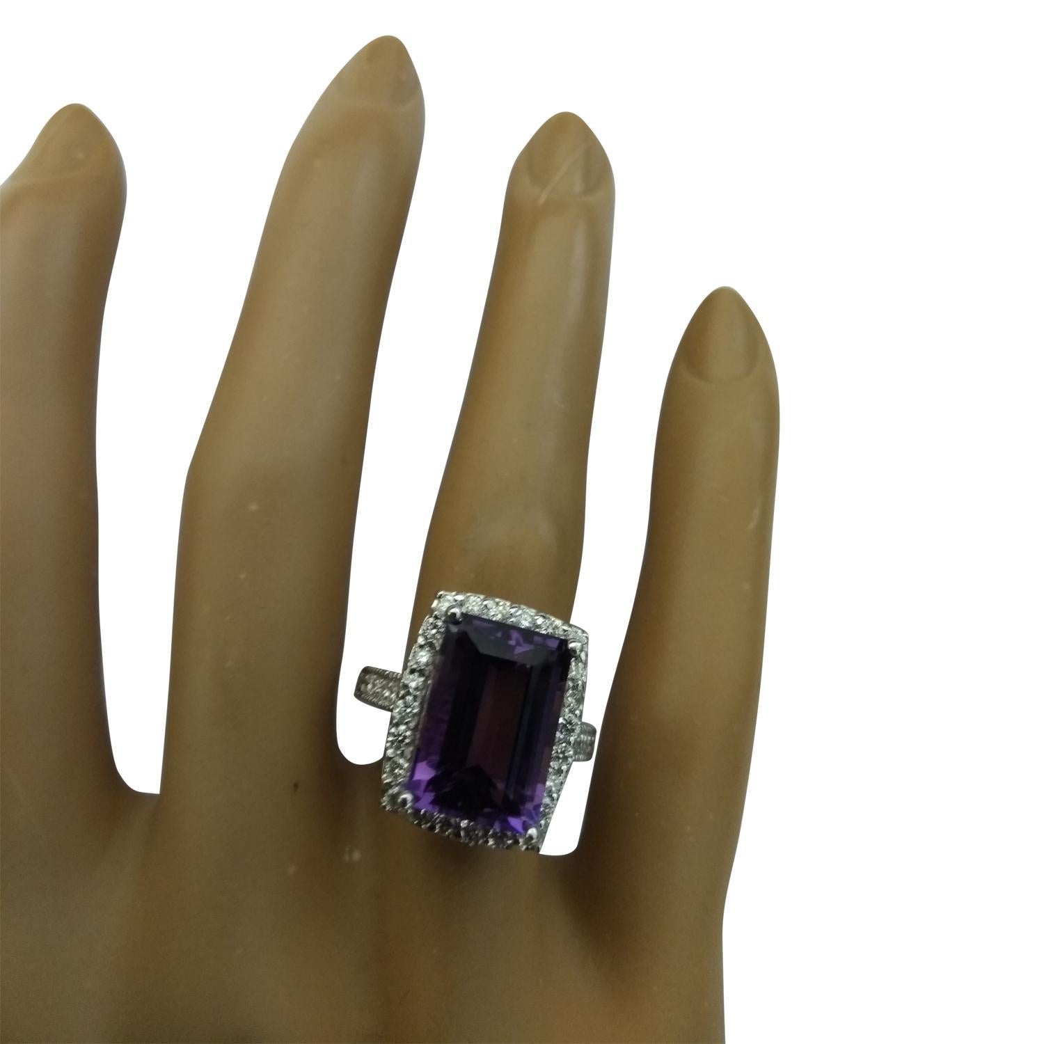 7.09 Carat Natural Amethyst 14 Karat Solid White Gold Diamond Ring
Stamped: 14K 
Total Ring Weight: 6 Grams 
Amethyst Weight 6.29 Carat (14.00x10.00 Millimeters)
Diamond Weight: 0.80 carat (F-G Color, VS2-SI1 Clarity )
Quantity: 34
Face Measures: