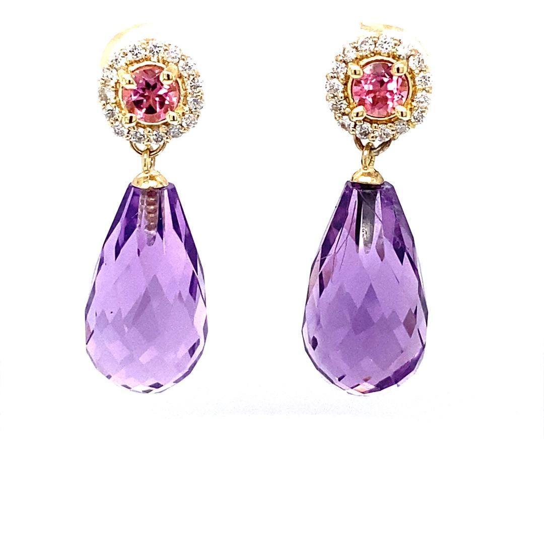 Natural Amethyst Diamond Tourmaline Yellow Gold Drop Earrings

Item Specs:

2 Faceted Briolette Amethyst stones weighing approximately 19.80 carats
(Measurements of Amethyst Faceted Briolette 17mm x 10mm) 
30 Round Cut Diamonds weighing