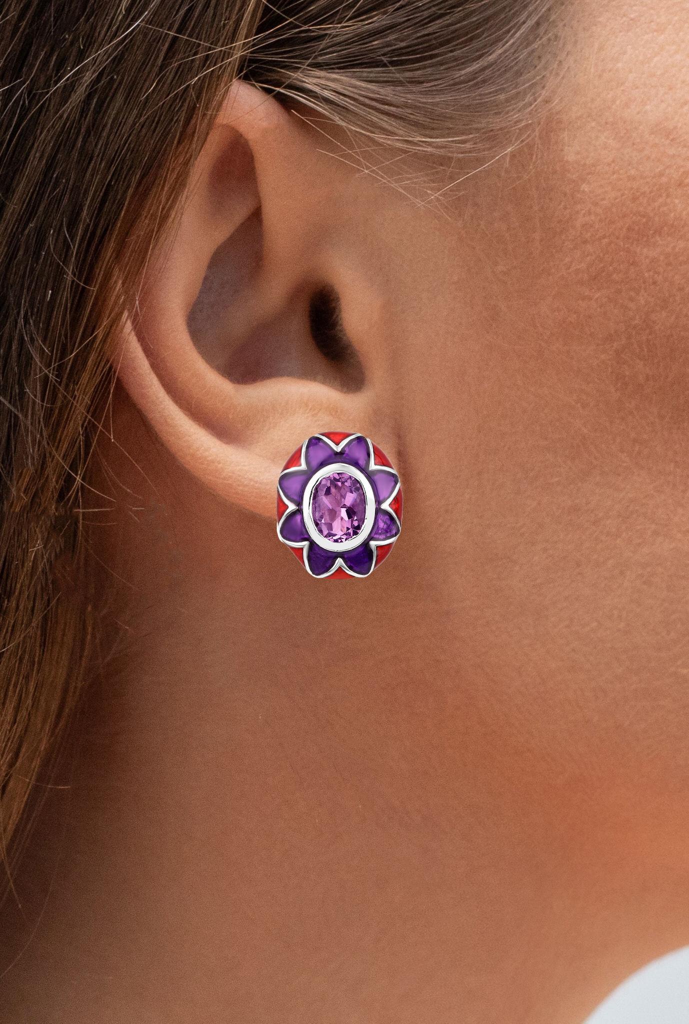 It comes with the Gemological Appraisal by GIA GG/AJP
All Gemstones are Natural
2 Amethysts = 2.30 Carats
Enamel: Purple, Red
Metal: Rhodium Plated Sterling Silver
Post With Friction Back
Dimensions: 16.5 x 14.2 mm