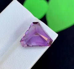 Gemma di ametista naturale: 10,44 carati di colore viola intenso taglio fantasia