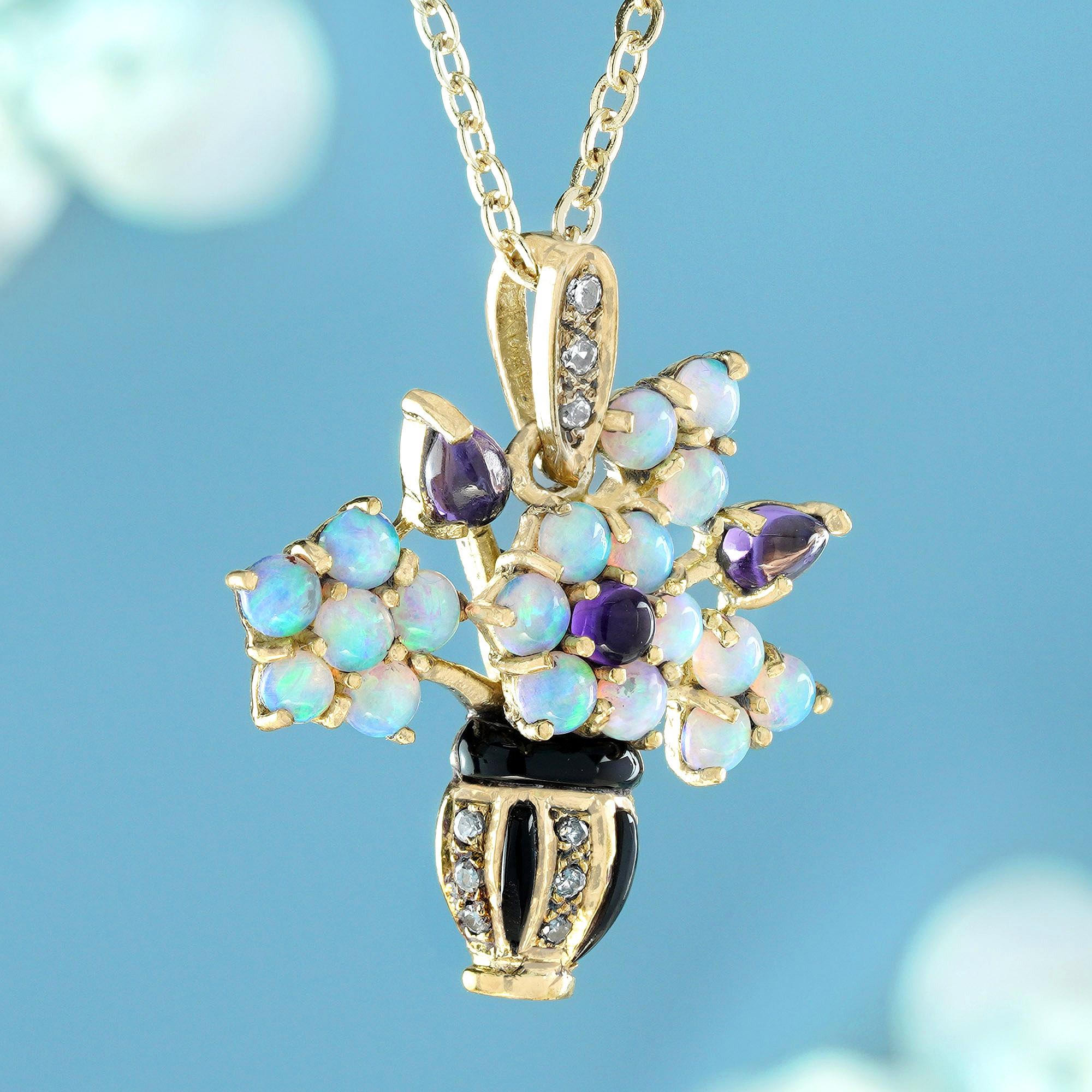   Crafted from solid yellow gold, exquisite pendant features a floral vase design adorned with a variety of gemstones in prong settings. The mix includes purple cabochon round and pear-shaped amethysts, as well as four clusters of round white opals.