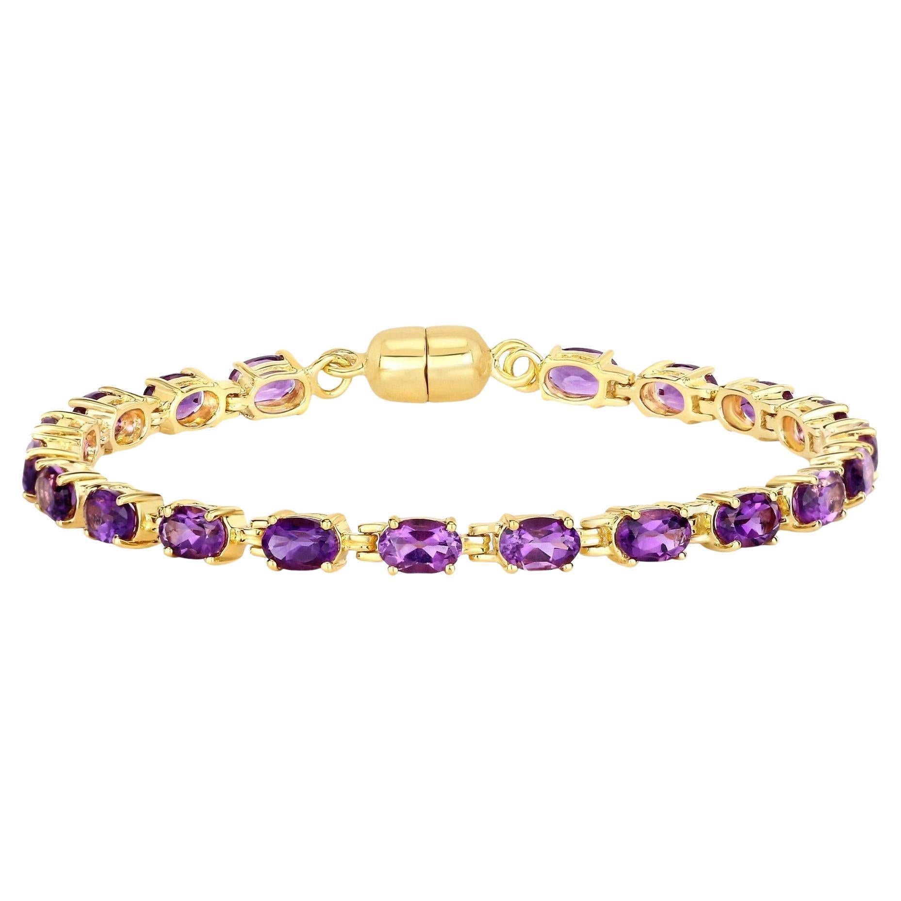 It comes with the appraisal by GIA GG/AJP
All Gemstones are Natural 
20 Oval Cut Amethysts = 8.40 Carats
Metal: 18K Yellow Gold Plated Silver
Bracelet Length: 7 Inches
Magnetic Clasp