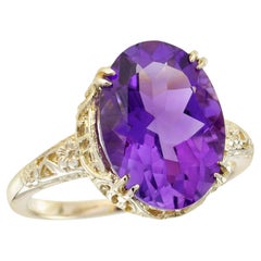 Anello con ametista naturale in stile vintage e filigrana in oro giallo massiccio 9K