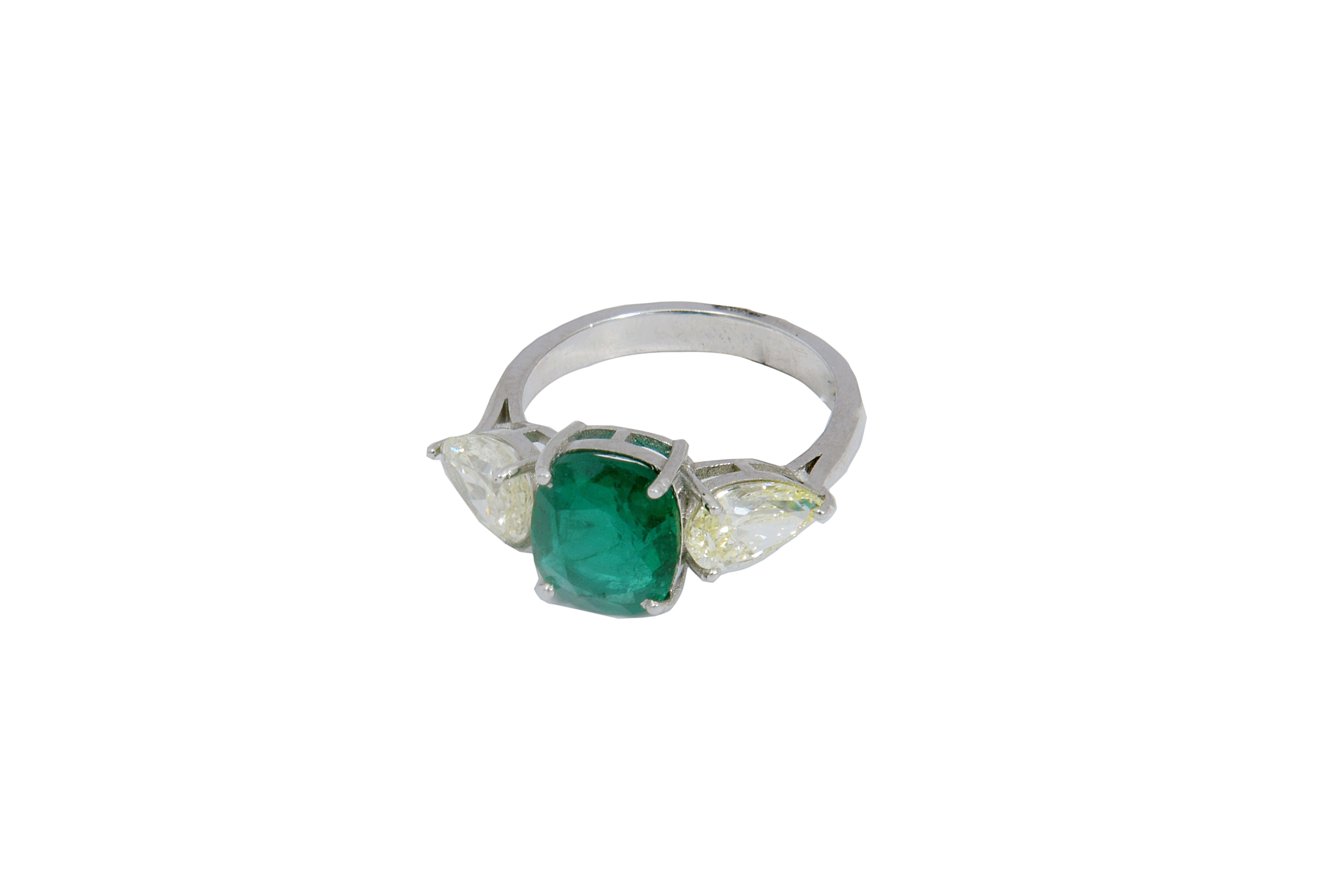 This is an amazing ring with 

Diamonds : 1.99 carats
Emerald : 2.48 carats

Gold : 2.816gms






It's a perfect ring for  a party wear. the quality of Diamonds are FG colour and vsi purity


 . Please read my reviews to make yourself comfortable.