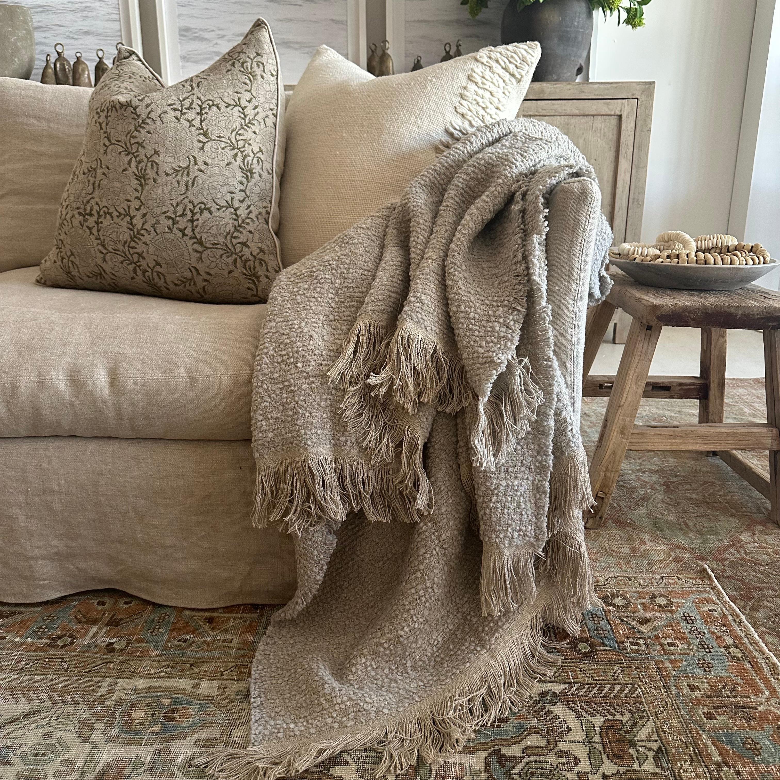 Woven in Belgium using traditional weaving techniques, Bloom Home Inc throw features a combination of smooth Belgian linen warp and an alternating Belgian linen and Alpaca wool weft. The boucle Alpaca weft creates a stunning texture that contrast