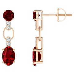 ANGARA Natural and Oval 1.20ct Ruby Dangle Earrings with Diamond in 14KRose Gold