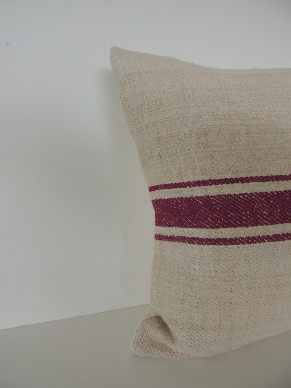Natural and purple stripe woven decorative pillow.
French grain sack front and natural linen backing.
Decorative pillow handcrafted and designed in the USA.
Closure by stitch (no zipper closure) with custom-made pillow insert.
Size: 19 x 19 x 6.
