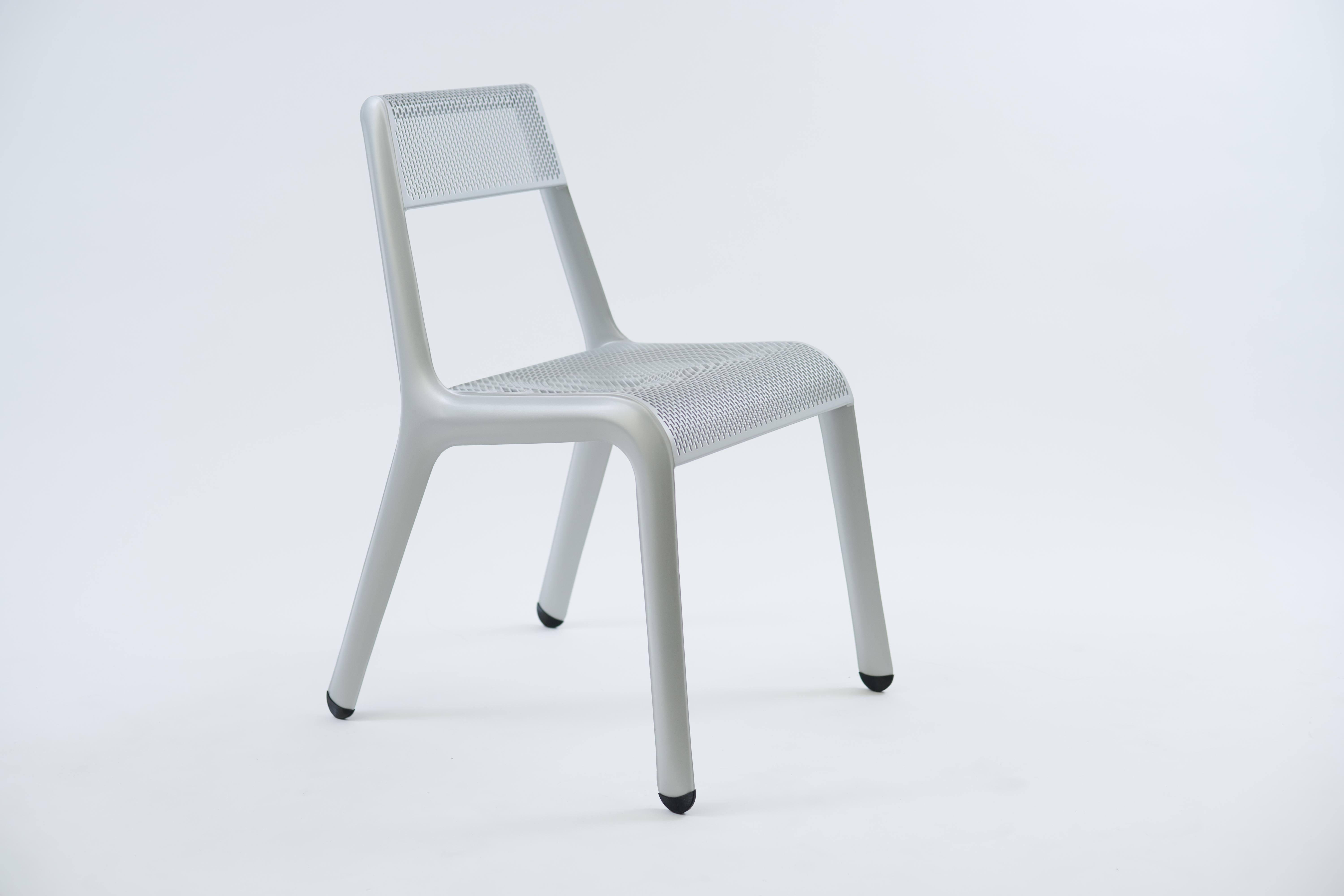 Natural Anodic Leggera chair by Zieta
Dimensions: D 58 x W 49 x H 78 cm 
Material: Carbon Steel. 
Finish: Powder-Coated.
Available in other colors. Also available in Ultraleggera version. 


LEGGERA chair is a steel seating with clean lines and