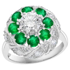 Anello vittoriano antico con smeraldo naturale e diamante solitario in platino