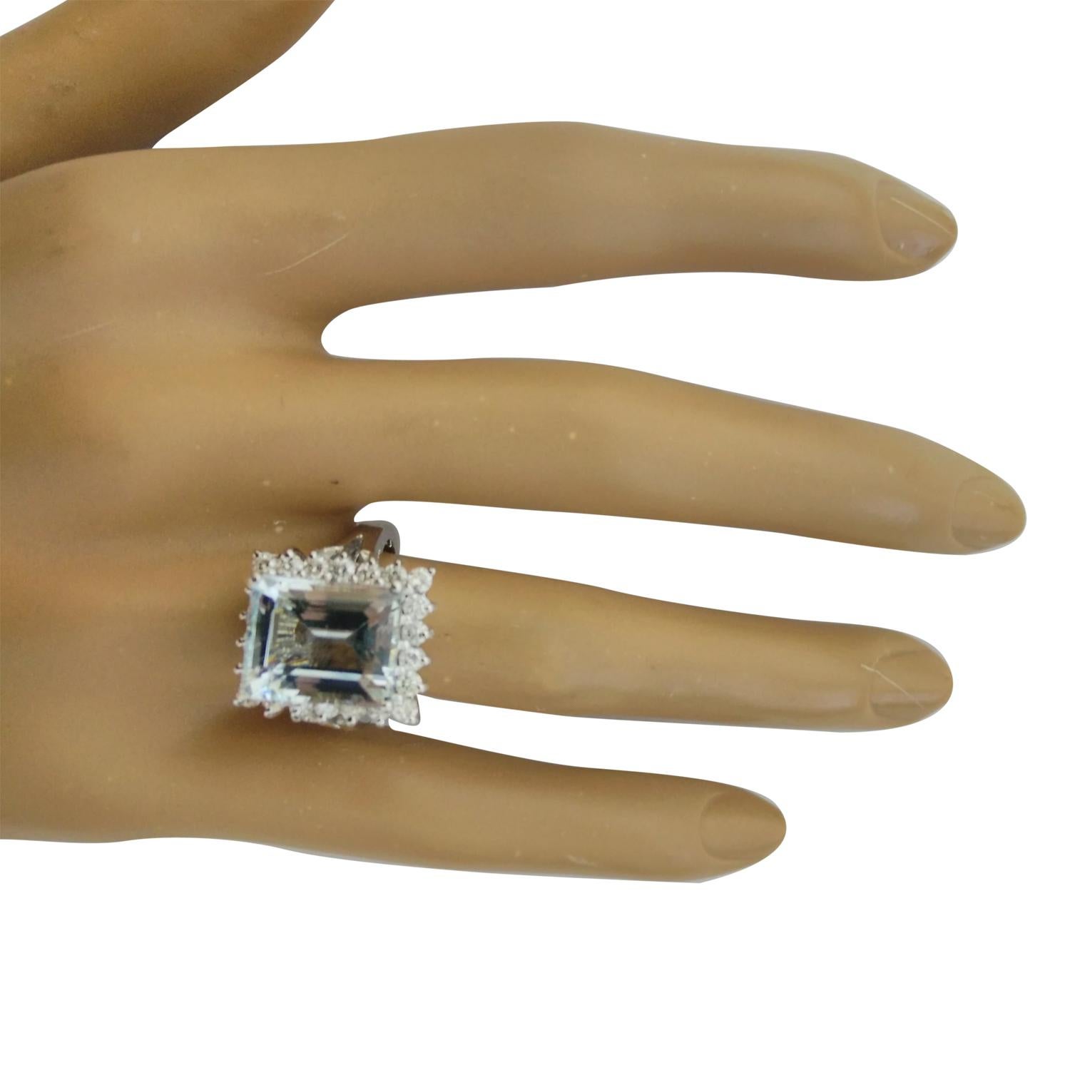 7.23 Carat Natural Aquamarine 14 Karat Solid White Gold Diamond Ring
Stamped: 14K 
Total Ring Weight: 9.2 Grams 
Aquamarine Weight: 6.43 Carat (12.00x10.00 Millimeters)  
Diamond Weight: 0.80 Carat (F-G Color, VS2-SI1 Clarity )
Face Measures: