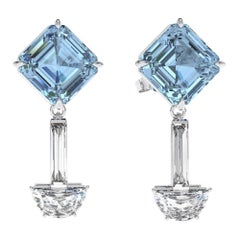 Boucles d
oreilles aigue-marine naturelle et diamant en platine 950