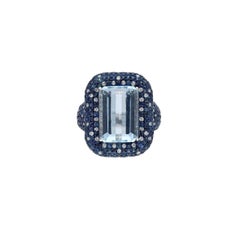 Anello con acquamarina naturale, zaffiro blu e diamante in oro 18 carati