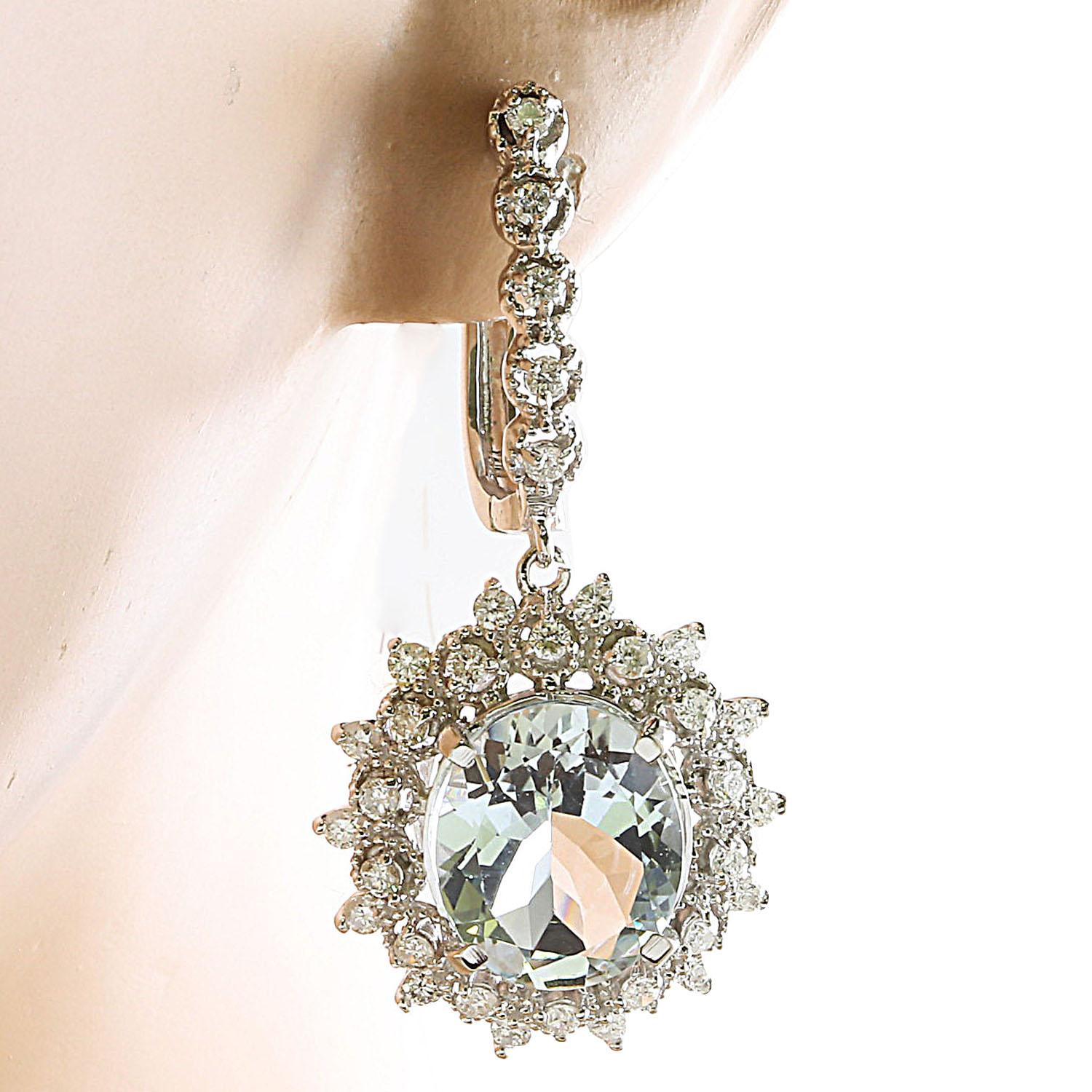 8.65 Carat Natural Aquamarine 14 Karat Solid White Gold Diamond Earrings
Stamped: 14K
Total Earrings Weight: 8.6 Grams 
Aquamarine Weight: 7.40 Carat (12.00x10.00 Millimeters) 
Diamond Weight: 1.25 Carat (F-G Color, VS2-SI1 Clarity)
Face Measures: