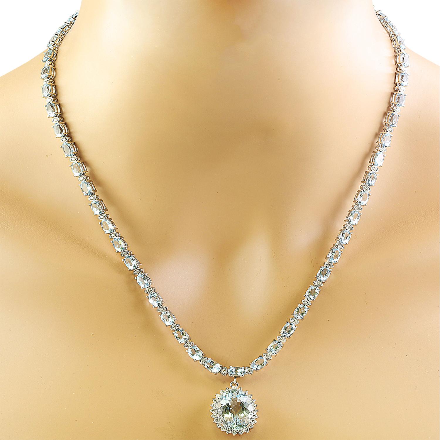 40.06 Carat Natural Aquamarine 14 Karat Solid White Gold Diamond Necklace
Stamped: 14K
Total Necklace Weight: 27.9 Grams
Necklace Length: 18 Inches
Center Aquamarine Weight: 8.87 Carat (16.00x12.00 Millimeters)
Side Aquamarine Weight 28.00 Carat