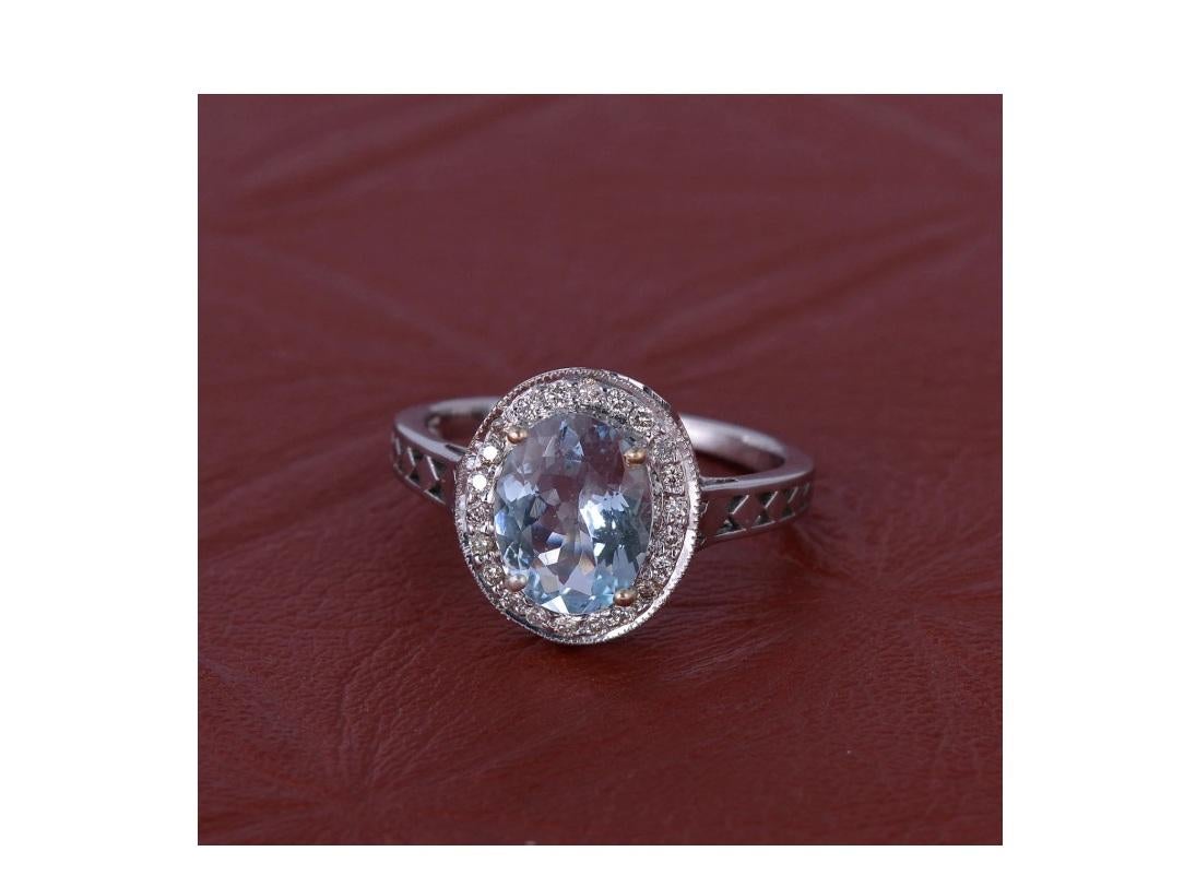This enchanting ring is crafted from 18K white gold and set with a 2.35 carat aquamarine gemstone. The ring has a unique design that is sure to get noticed, and it would make a perfect addition to any jewelry