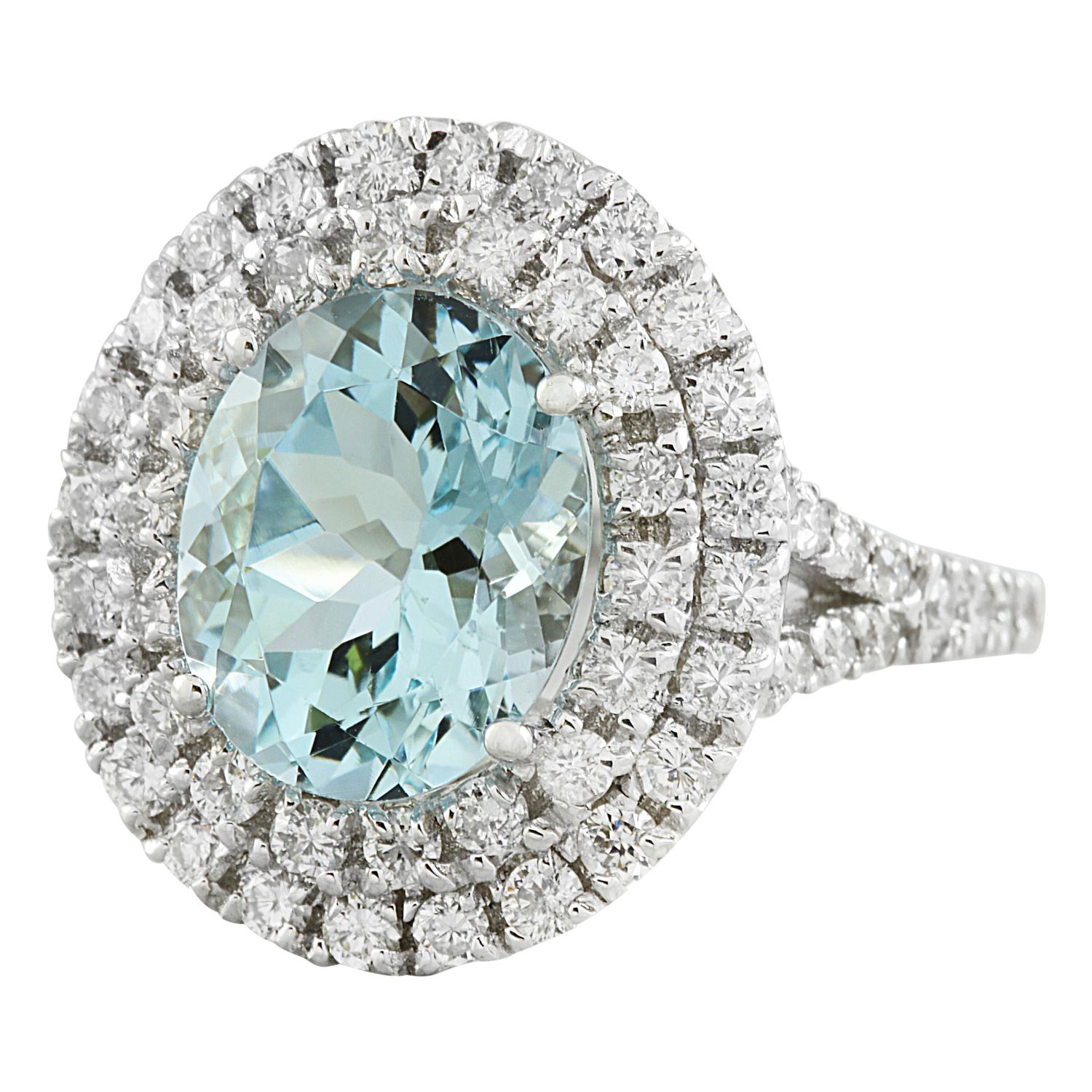 Introducing our magnificent 14K Solid White Gold Diamond Ring, adorned with a breathtaking 5.35 Carat Natural Aquamarine. Stamped with authenticity, this ring is a testament to superior craftsmanship and timeless beauty. Weighing 6.1 grams in total,