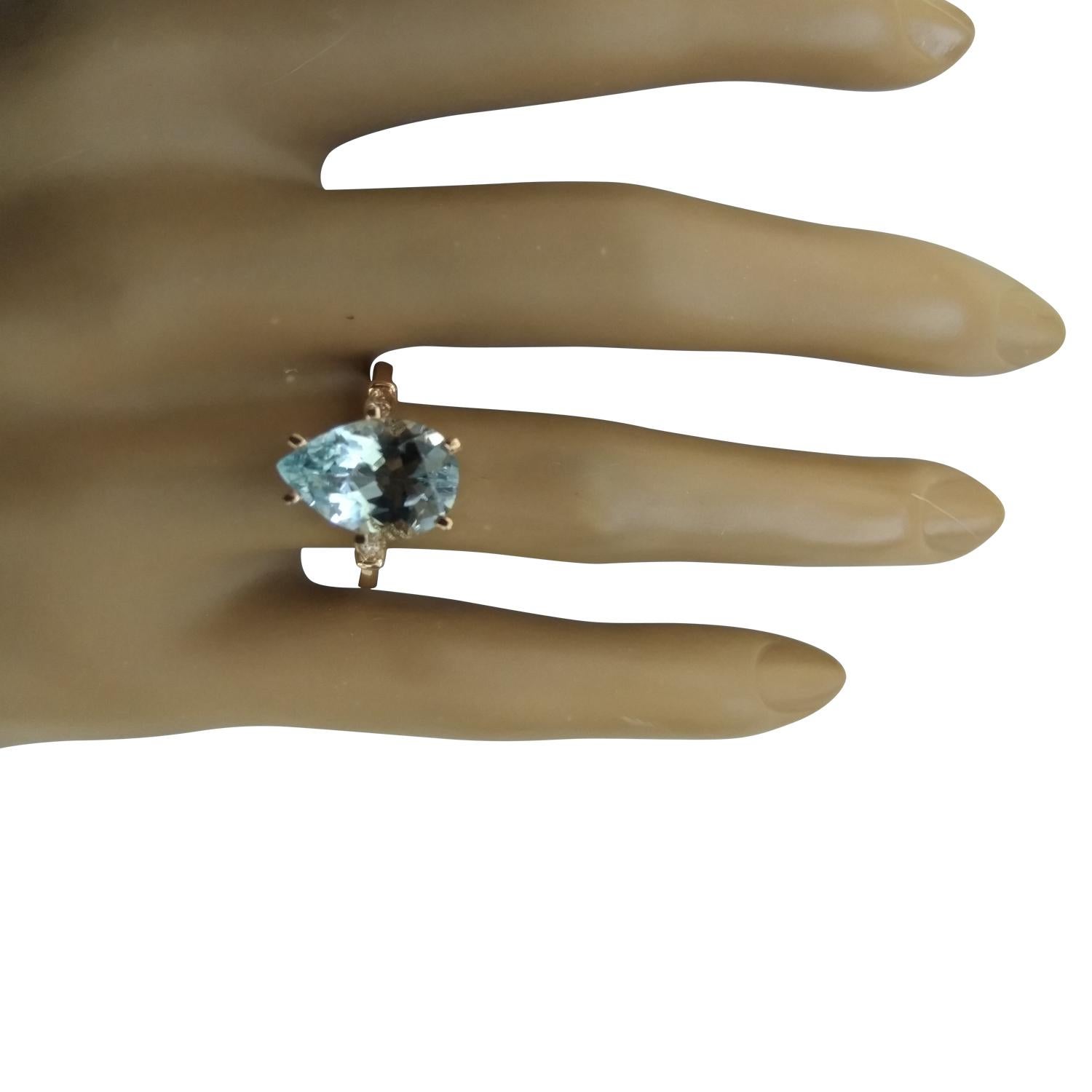 3.60 Carat Natural Aquamarine 14 Karat Solid Rose Gold Diamond Ring
Stamped: 14K 
Total Ring Weight: 3.9 Grams 
Aquamarine Weight 3.52 Carat (13.00x9.00 Millimeters)
Diamond Weight: 0.08 carat (F-G Color, VS2-SI1 Clarity )
Face Measures: 13.00x9.00