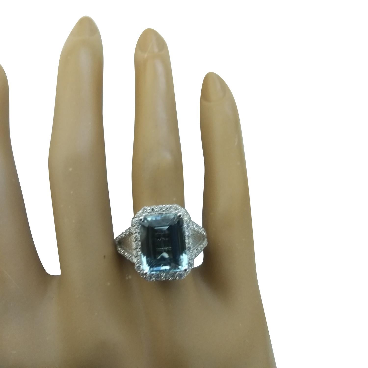 5.90 Carat Natural Aquamarine 14 Karat Solid White Gold Diamond Ring
Stamped: 14K 
Total Ring Weight: 6.5 Grams 
Aquamarine Weight 5.20 Carat (11.00x9.00 Millimeters)
Diamond Weight: 0.70 carat (F-G Color, VS2-SI1 Clarity )
Quantity: 56
Face