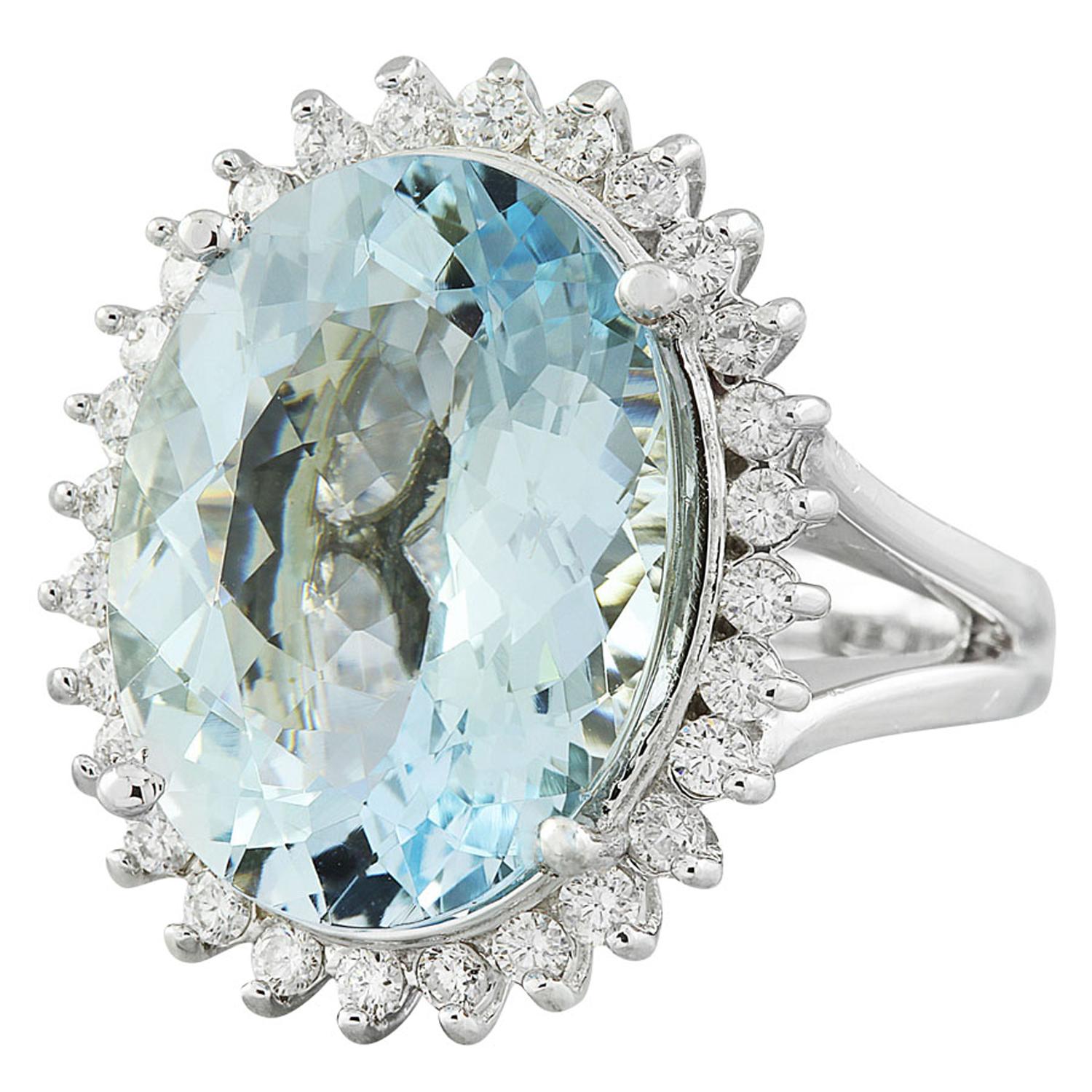 13.16 Carat Natural Aquamarine 14 Karat Solid White Gold Diamond Ring
Stamped: 14K 
Total Ring Weight: 12.8 Grams 
Aquamarine Weight 12.44 Carat (18.00x13.00 Millimeters)
Diamond Weight: 0.72 carat (F-G Color, VS2-SI1 Clarity)
Face Measures: