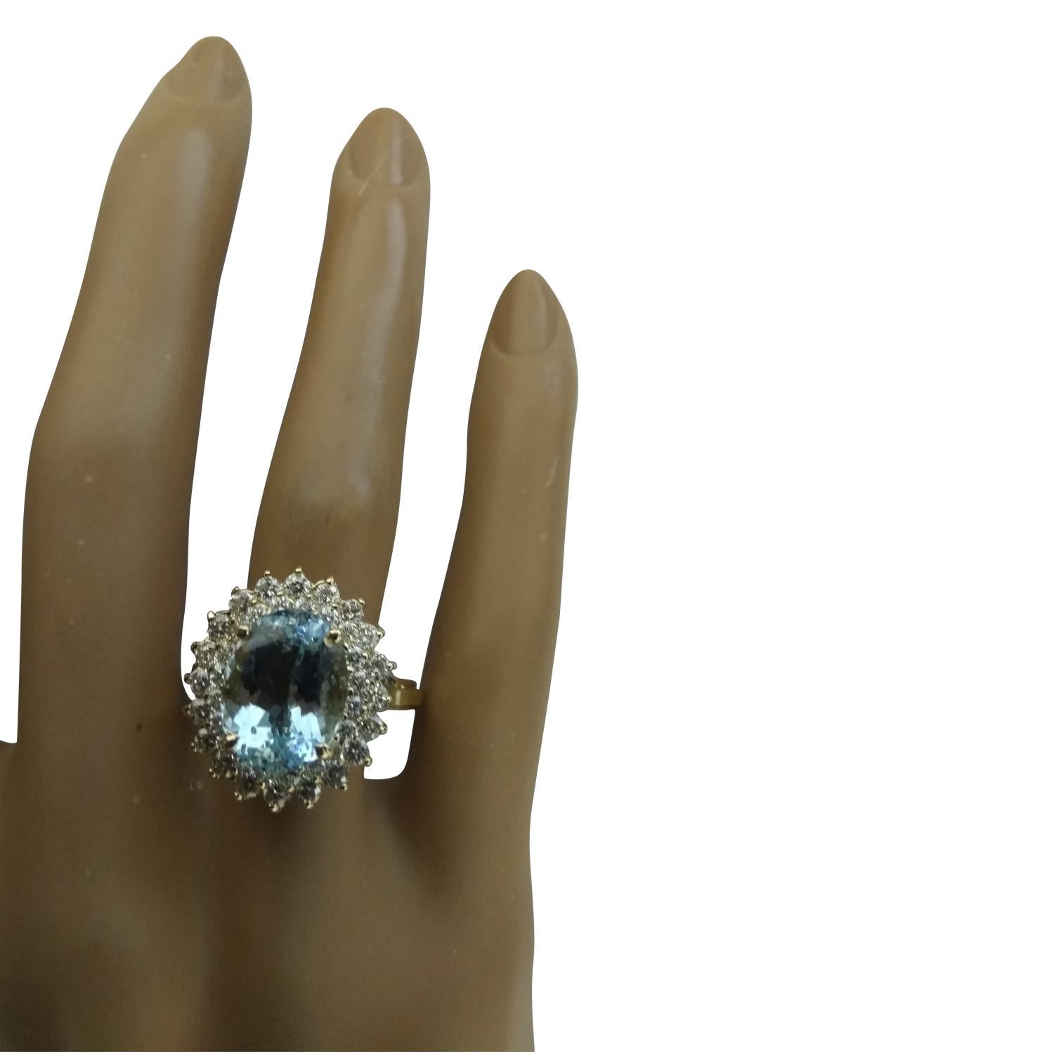 6.10 Carat Natural Aquamarine 14 Karat Solid Yellow Gold Diamond Ring
Stamped: 14K 
Total Ring Weight: 7.9 Grams
Aquamarine Weight 4.90 Carat (12.00x10.00 Millimeters)
Diamond Weight: 1.20 carat (F-G Color, VS2-SI1 Clarity )
Face Measures: