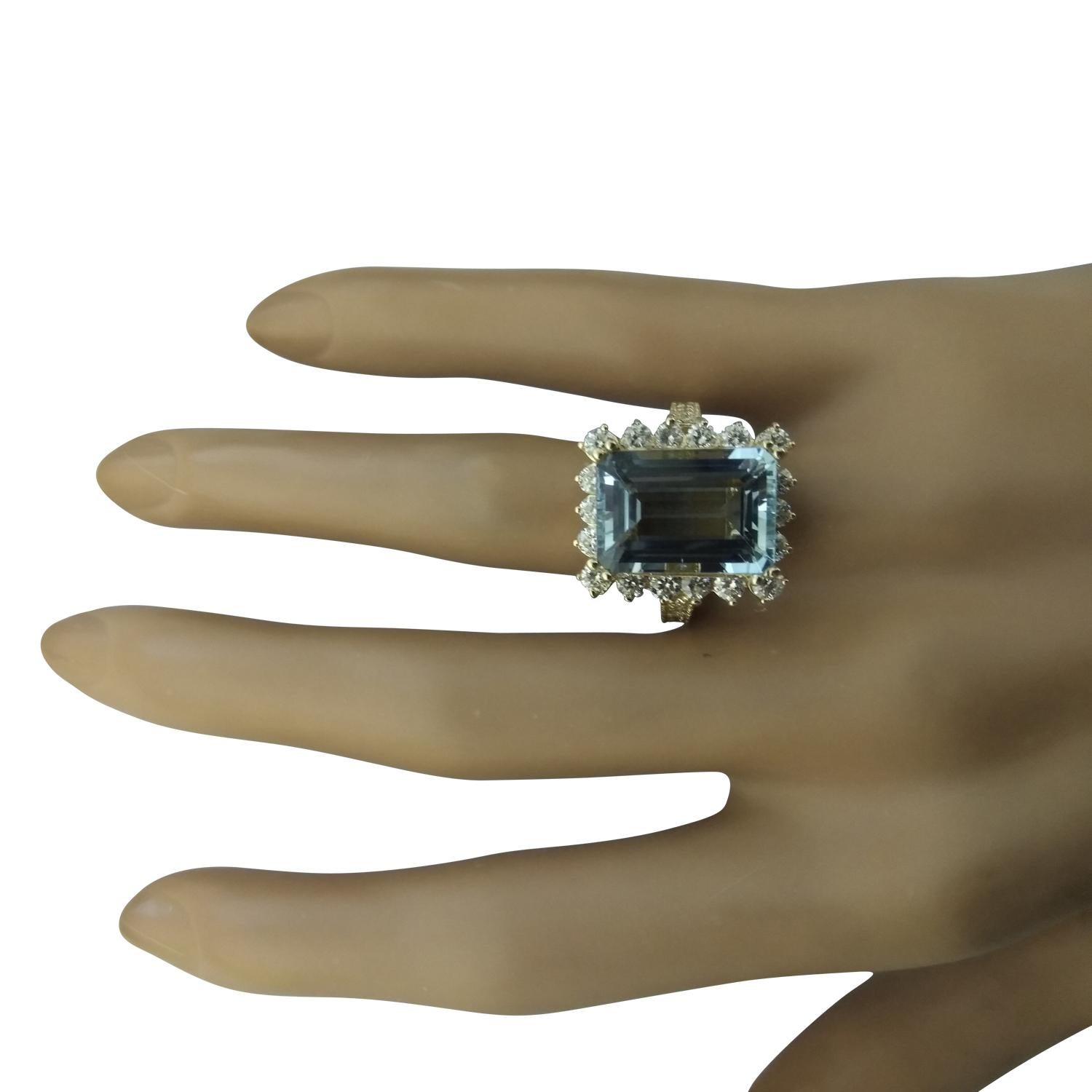 8.75 Carat Natural Aquamarine 14 Karat Solid Yellow Gold Diamond Ring
Stamped: 14K 
Total Ring Weight: 6.8 Grams 
Aquamarine Weight 7.27 Carat (14.00x10.00 Millimeters)
Diamond Weight: 1.48 carat (F-G Color, VS2-SI1 Clarity )
Face Measures: