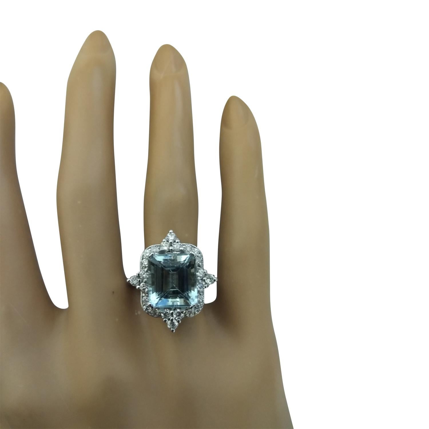 5.05 Carat Natural Aquamarine 14 Karat Solid White Gold Diamond Ring
Stamped: 14K 
Total Ring Weight: 5.6 Grams 
Aquamarine Weight 4.35 Carat (10.00x8.00 Millimeters)
Diamond Weight: 0.70 carat (F-G Color, VS2-SI1 Clarity )
Face Measures: