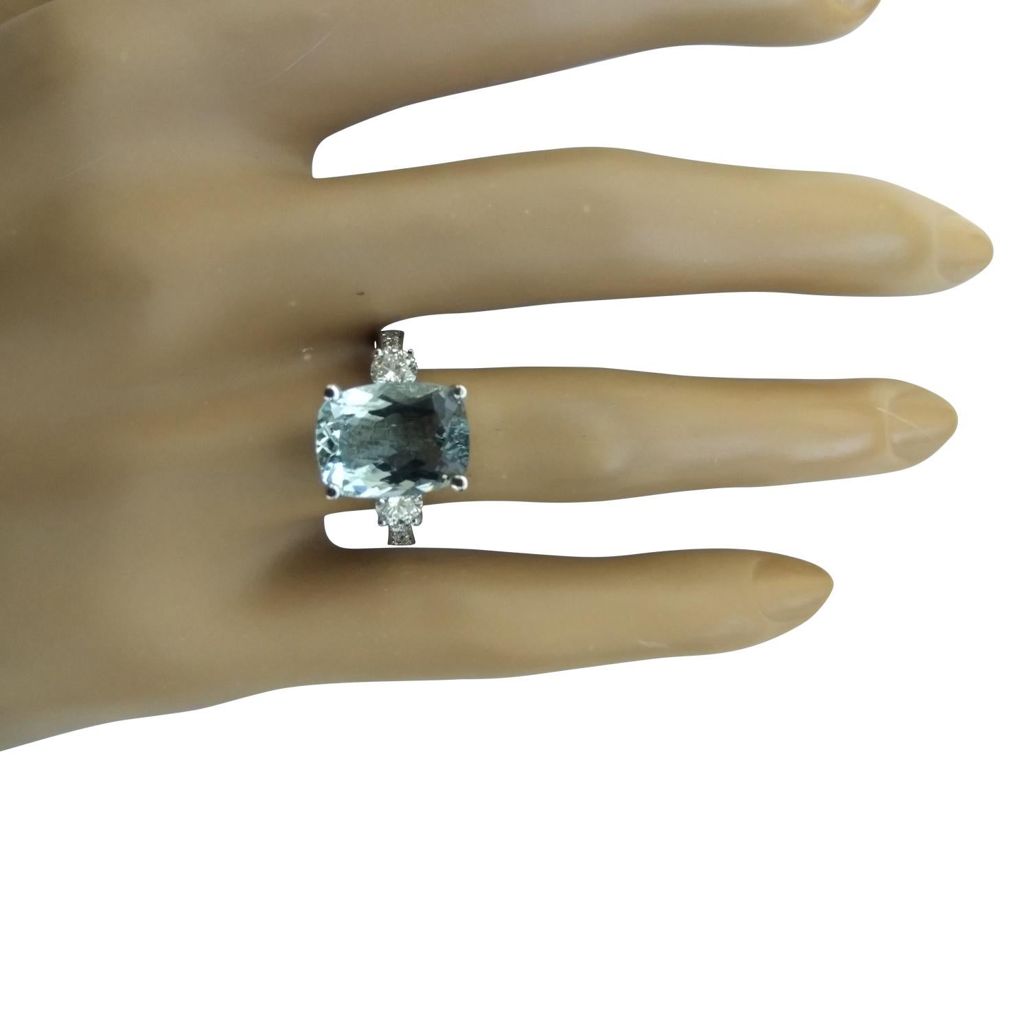 4.75 Carat Natural Aquamarine 14 Karat Solid White Gold Diamond Ring
Stamped: 14K 
Total Ring Weight: 4.1 Grams 
Aquamarine Weight 4.15 Carat (11.00x9.00 Millimeters)
Color: Blue
Treatment: Heating
Diamond Weight: 0.60 Carat (F-G Color, VS2-SI1