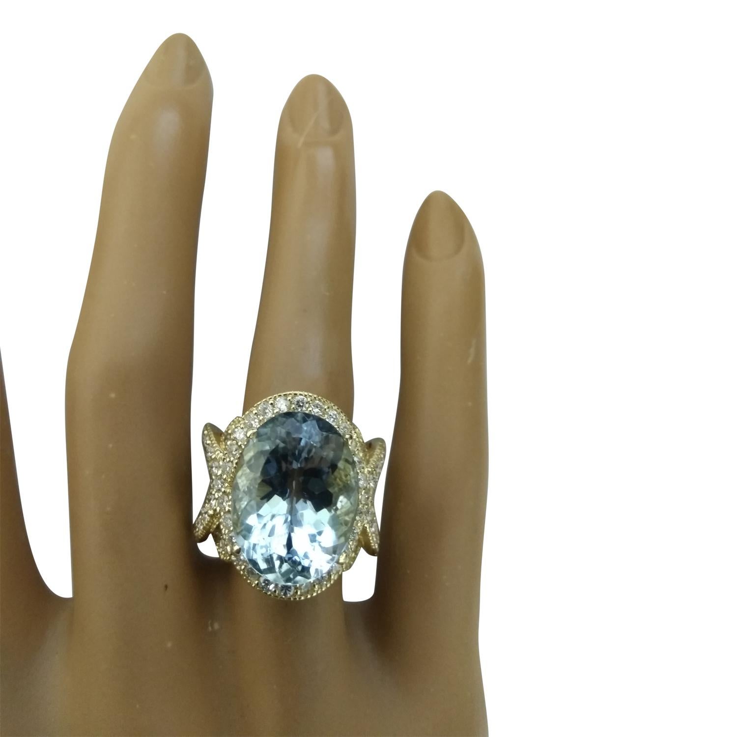 12.21 Carat Natural Aquamarine 14 Karat Solid Yellow Gold Diamond Ring
Stamped: 14K 
Total Ring Weight: 13.4 Grams 
Aquamarine Weight 10.21 Carat (16.00x12.00 Millimeters)
Diamond Weight: 2.00 carat (F-G Color, VS2-SI1 Clarity )
Face Measures: 21.00