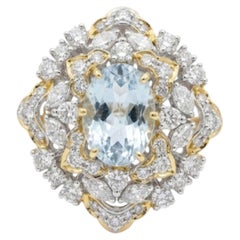 Bague en or 18k avec aigue-marine naturelle et diamant