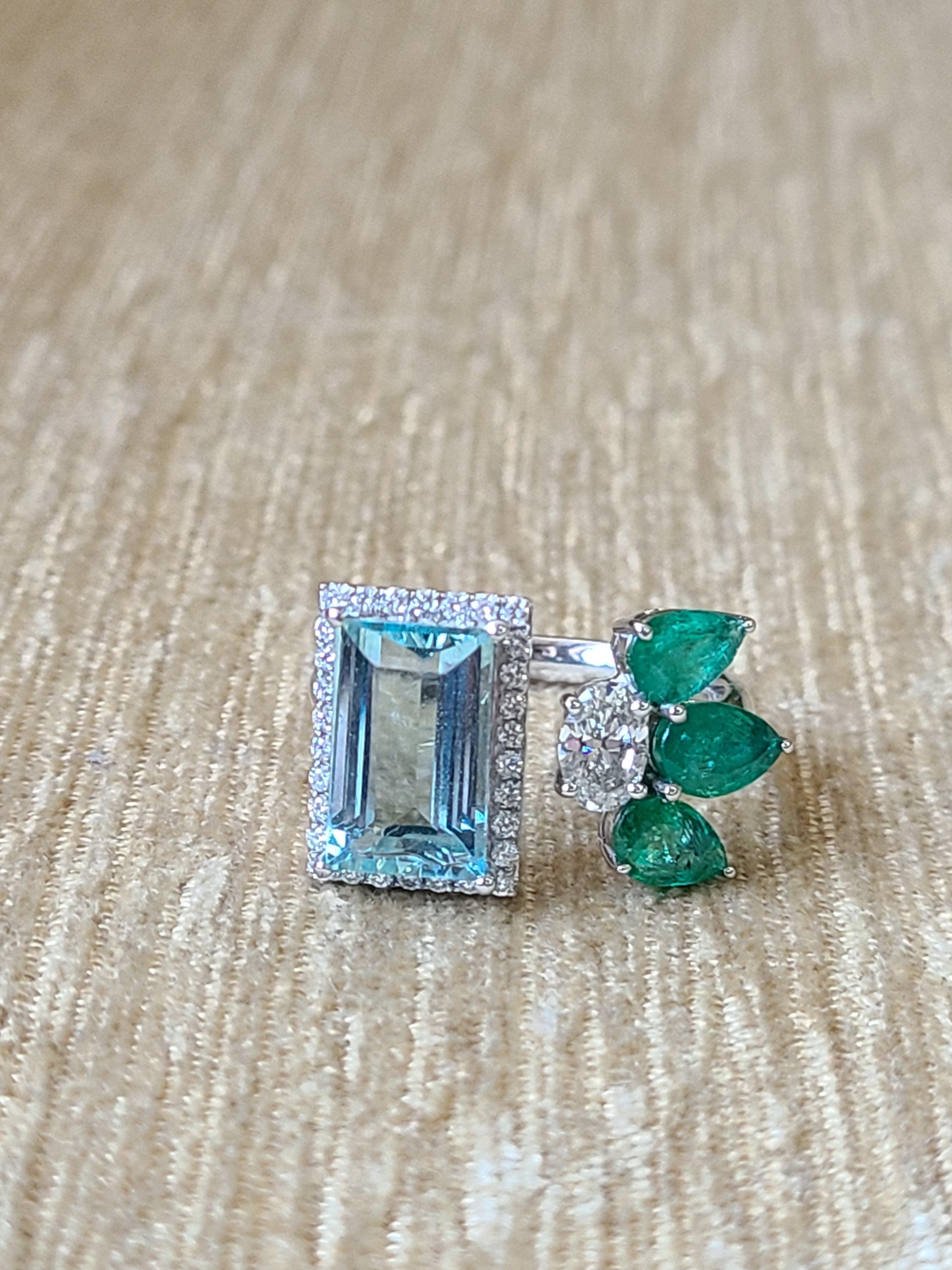 Modern Natural Aquamarine, Emerald and Diamond Ring Set in 18 Karat Gold