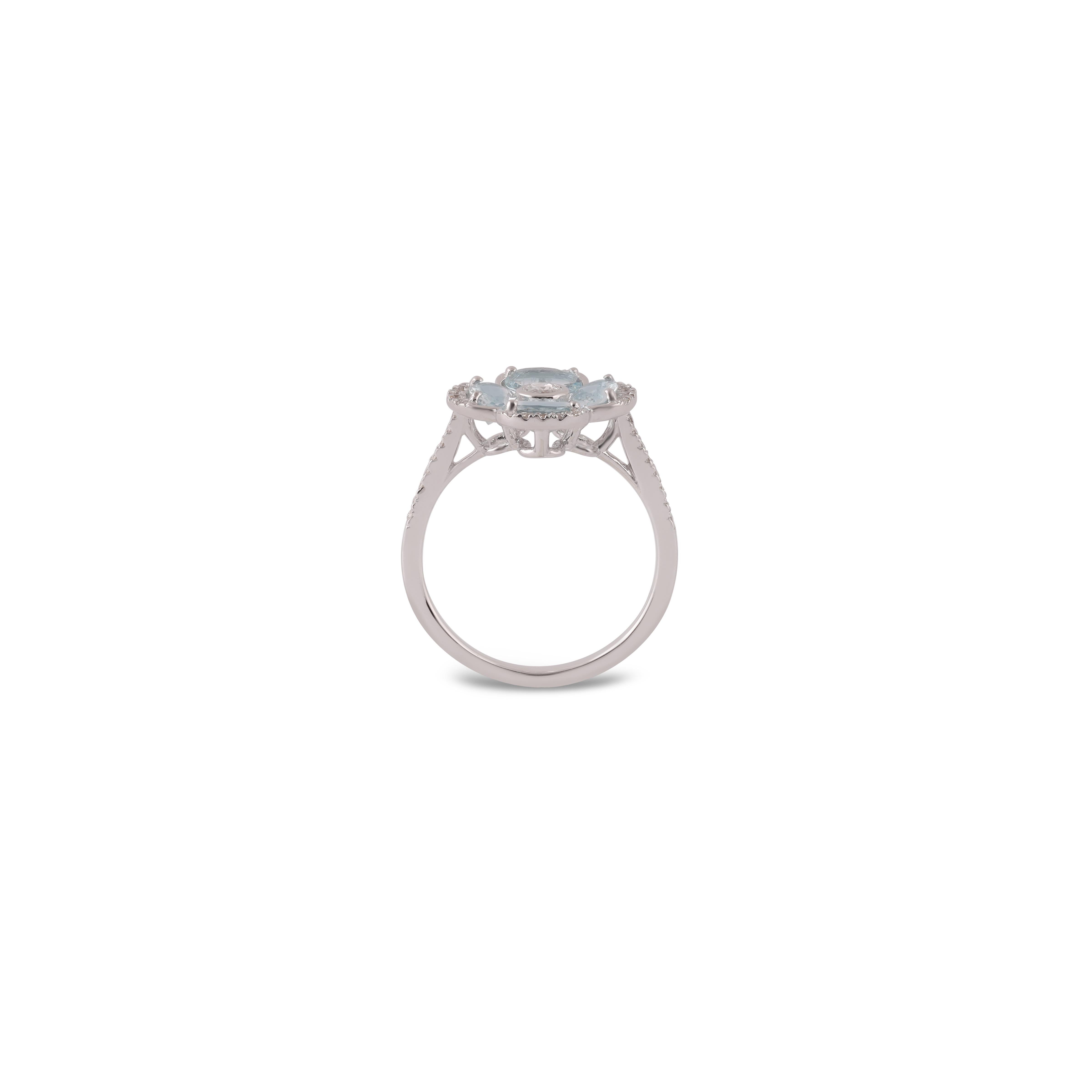 Contemporary Natural Aquamarine Four-Stone Flower Ring in 18k White Gold For Sale