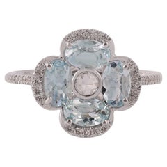 Natural Aquamarine Four-Stone Flower Ring in 18k White Gold