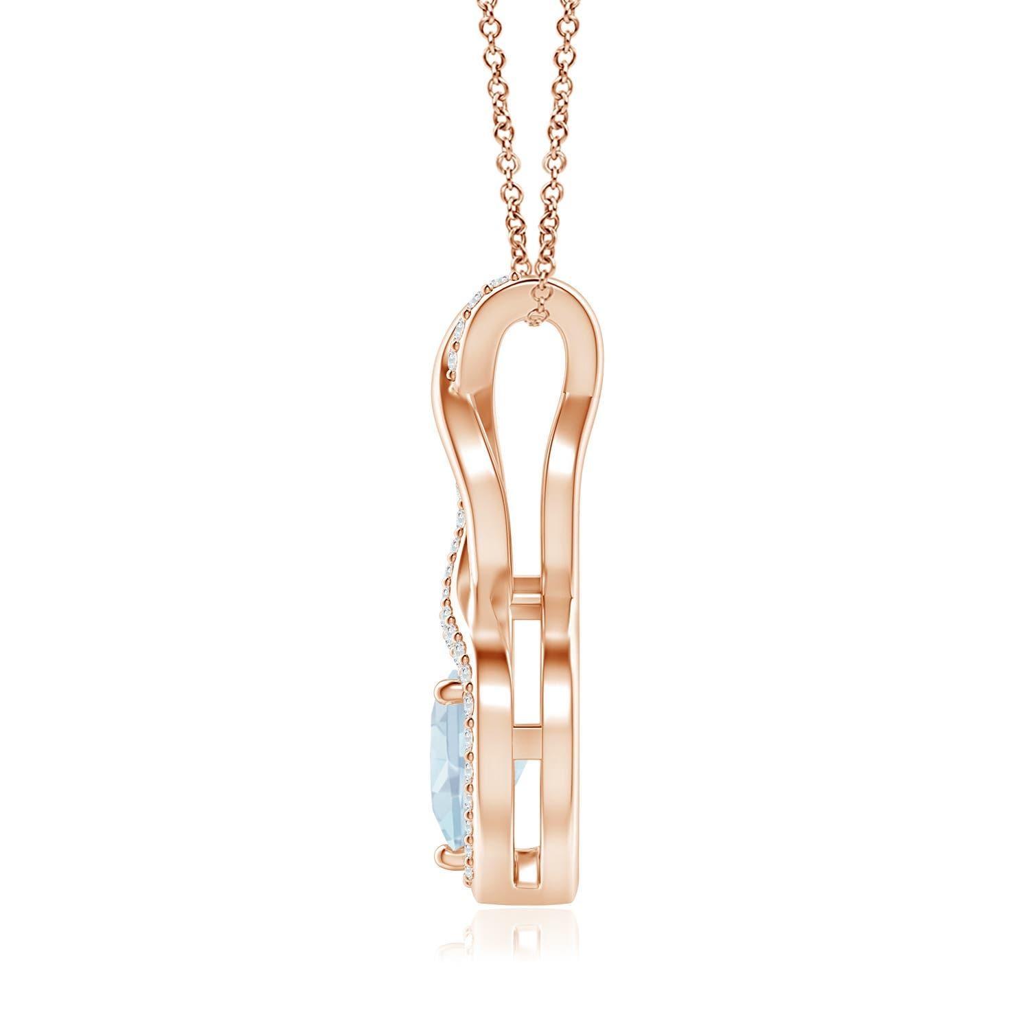 A diamond studded strip entwines with a lustrous metal strip to form an ornate infinity. Floating amid the graceful infinity is an icy blue heart-shaped aquamarine in a prong setting. The sparkling diamonds infuse a captivating edge to this 14k rose
