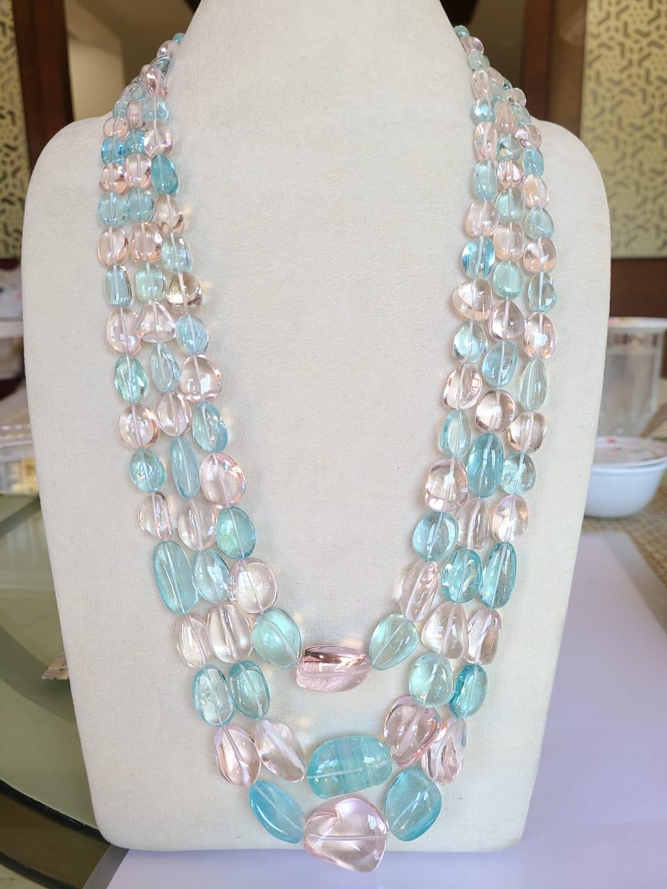 A very gorgeous and one of a kind, natural Aquamarine & Morganite beaded, Multi-Strand Necklace. The combined weight of the stones is 1185.65 carats. The necklace has 3 strands and is of a pastel hue. The Aquamarines & Morganites are completely